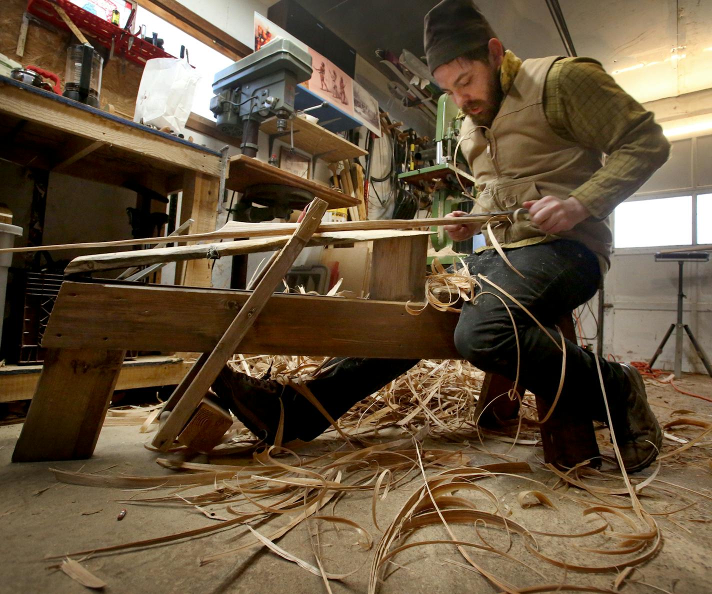 Maxwell Kelsey used a piece of ash that he split from a log and a draw knife to shape the wood into a lacrosse stick.