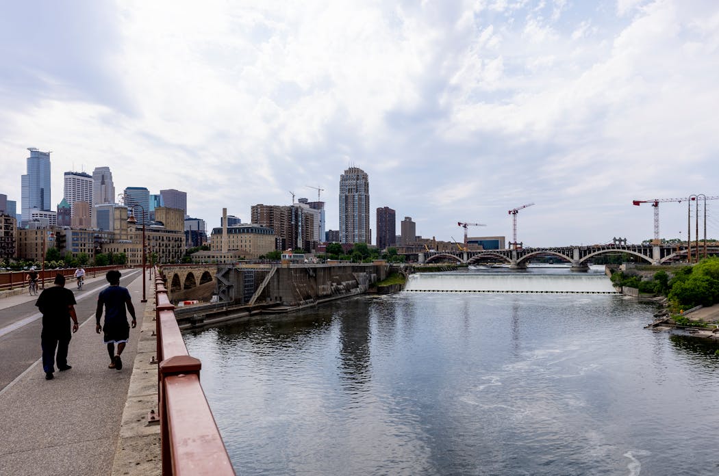 View of the Mississippi River at St. Anthony Falls from the Stone Arch Bridge in Minneapolis on June 17, 2021.