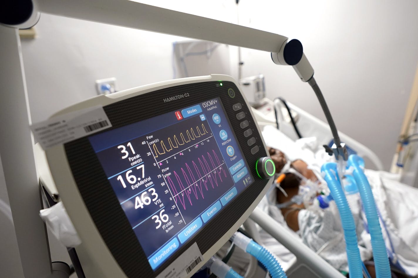 A ventilator helps a COVID-19 patient breath inside the Coronavirus Unit at United Memorial Medical Center, Monday, July 6, 2020, in Houston. (AP Photo/David J. Phillip)