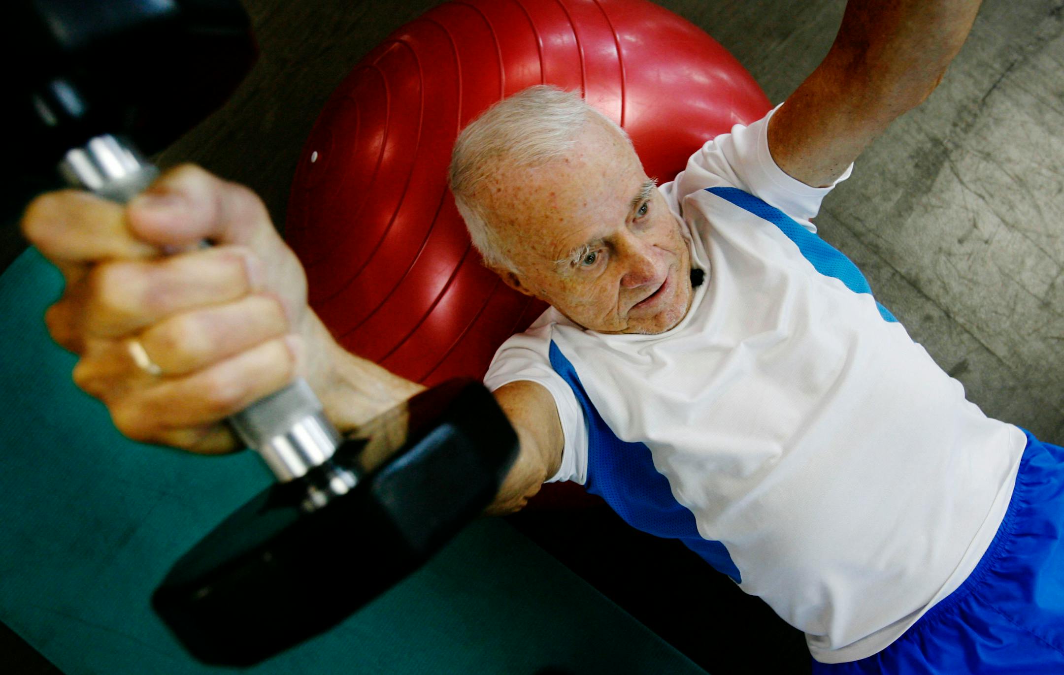 Sprinter Jim Hammond, 94, of Maple Grove, lifts weights at Lifetime Fitness as part of his five-day-a-week training regimen.
