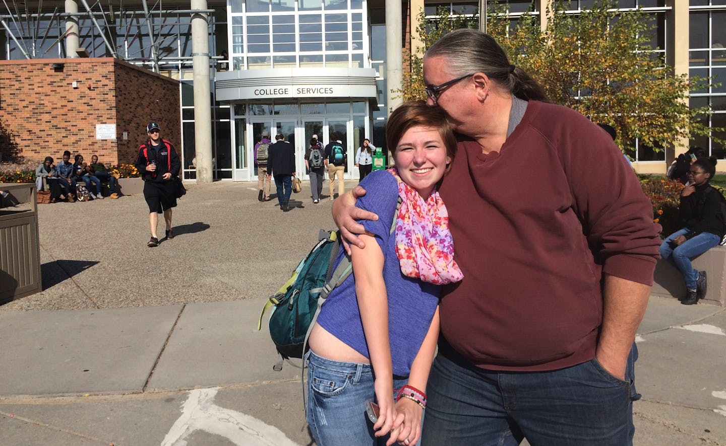 Photo by John Reinan: A relieved Bill Pekarna embraced his daughter, Maggie Pekarna, a student at Normandale Community College, after a lockdown ended early Wednesday afternoon at the Bloomington school.