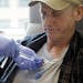 In this photo taken March 21, 2017, lymphoma patient Peter Bjazevich receives cellular immunotherapy as part of a study at the Fred Hutchinson Cancer 