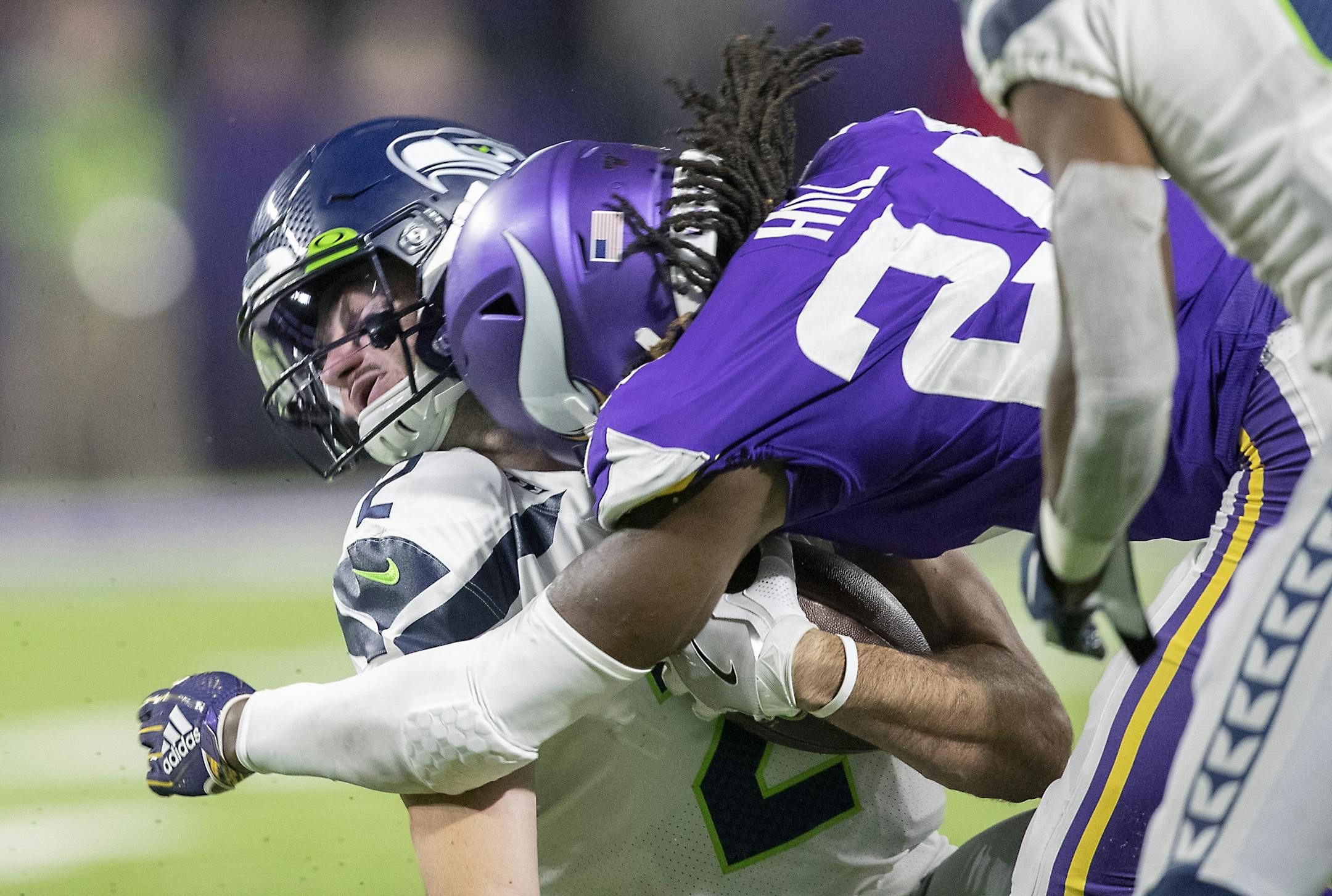 Vikings defensive back Holton Hill hit Seahawks' quarterback Paxton Lynch during the fourth quarter in the pre-season matchup between the Minnesota Vikings and the Seattle Seahawks at US Bank Stadium, Sunday, August 18, 2019 in Minneapolis, MN. Hill was ejected from the game after the hit.