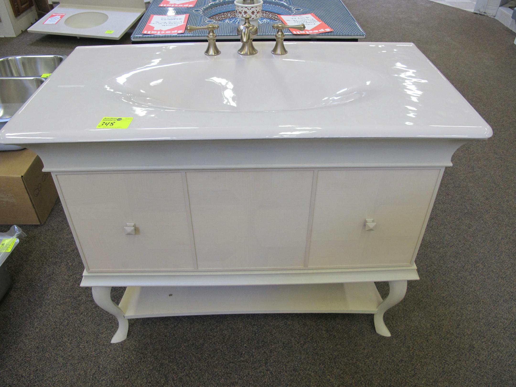 A Kohler vanity, cast iron top and faucet sold for $790 (originally $3,019) at the Auctionmasters.com sale of the Home Valu items in the Bloomington store.