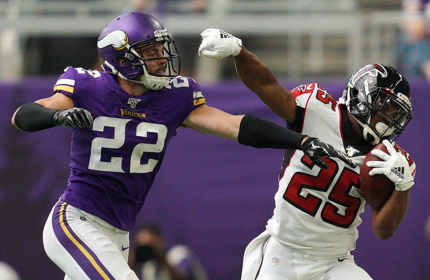 Minnesota Vikings free safety Harrison Smith (22) pushed Atlanta Falcons running back Ito Smith (25) out of bounds as he ran with the ball in the first half. ] ANTHONY SOUFFLE &#x2022; anthony.souffle@startribune.com The Minnesota Vikings played the Atlanta Falcons in their NFL season opener Sunday, Sept. 8, 2019 at U.S. Bank Stadium in Minneapolis.