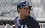 New York Yankees' Gleyber Torres warms-up before the game against the Toronto Blue Jays at Yankee Stadium Sunday, April 22, 2018 in New York. (AP Phot