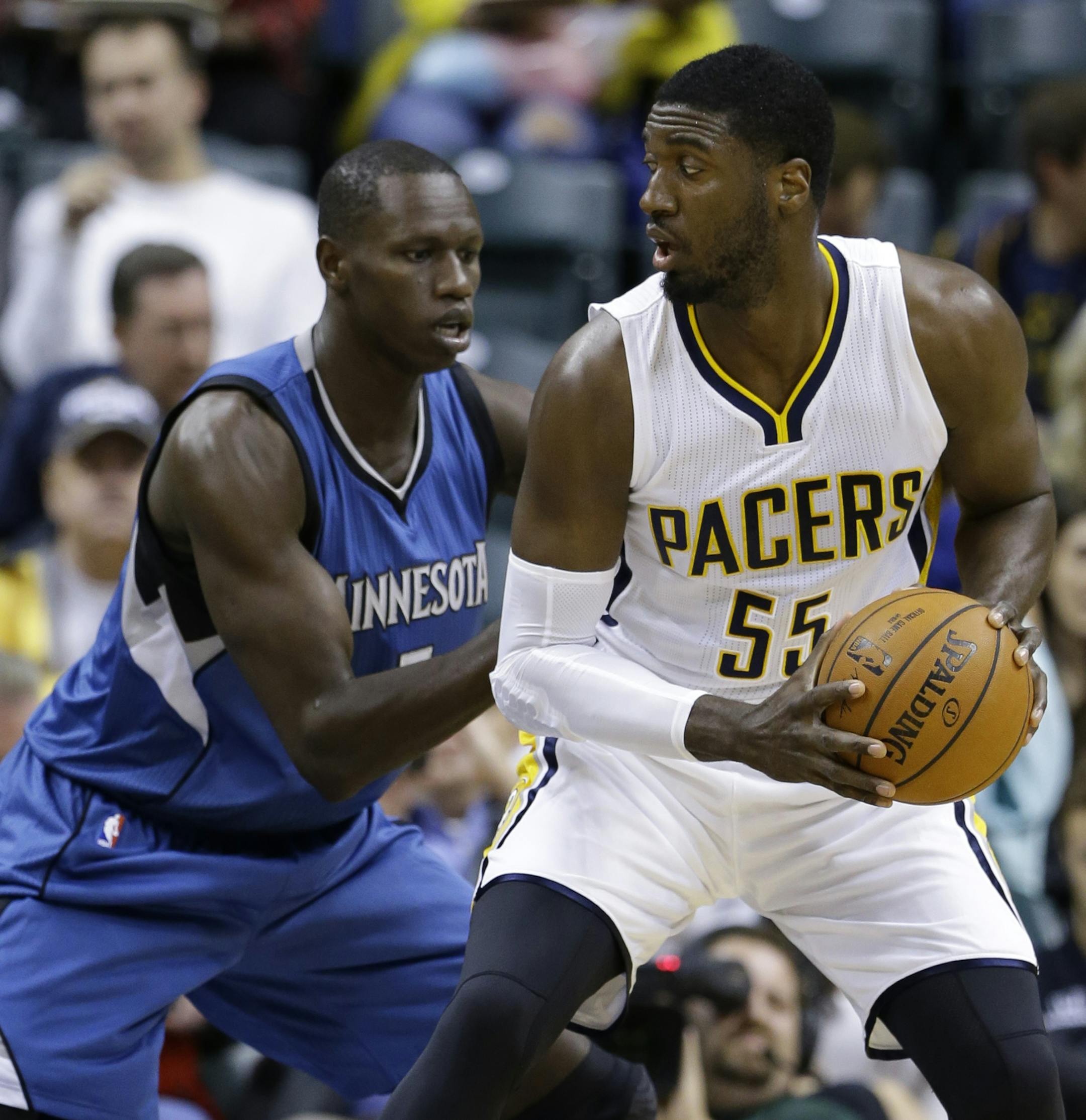 Timberwolves center Gorgui Dieng, left, defended against Pacers center Roy Hibbert during the first half Tuesday.