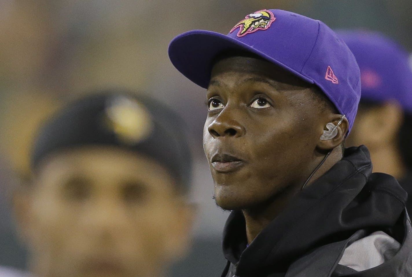 Minnesota Vikings' Teddy Bridgewater on the sidelines during the second half of an NFL football game against the Green Bay Packers Thursday, Oct. 2, 2014, in Green Bay, Wis. (AP Photo/Tom Lynn)