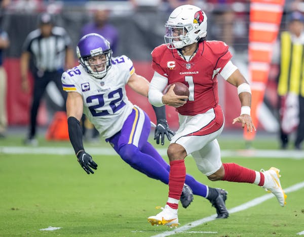 Arizona quarterback Kyler Murray drove past Vikings free safety Harrison Smith for a touchdown in the second quarter