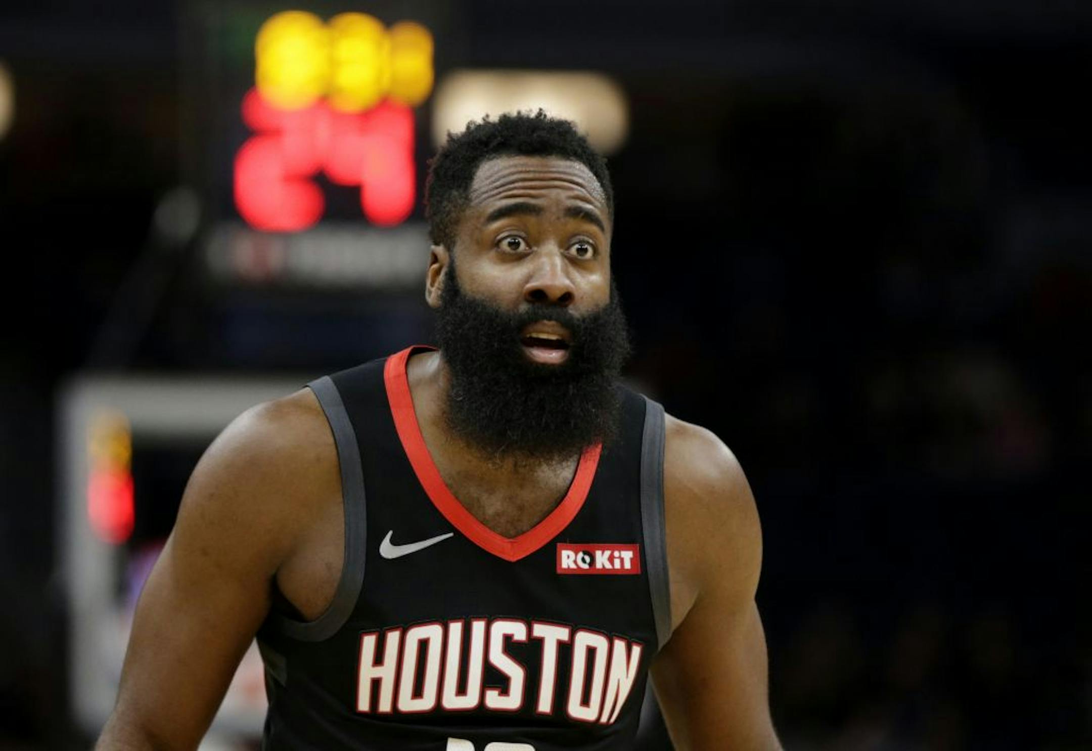 Houston Rockets guard James Harden looks at an official in the first quarter of a basketball game against the Minnesota Timberwolves Saturday, Nov. 16, 2019 in Minneapolis.