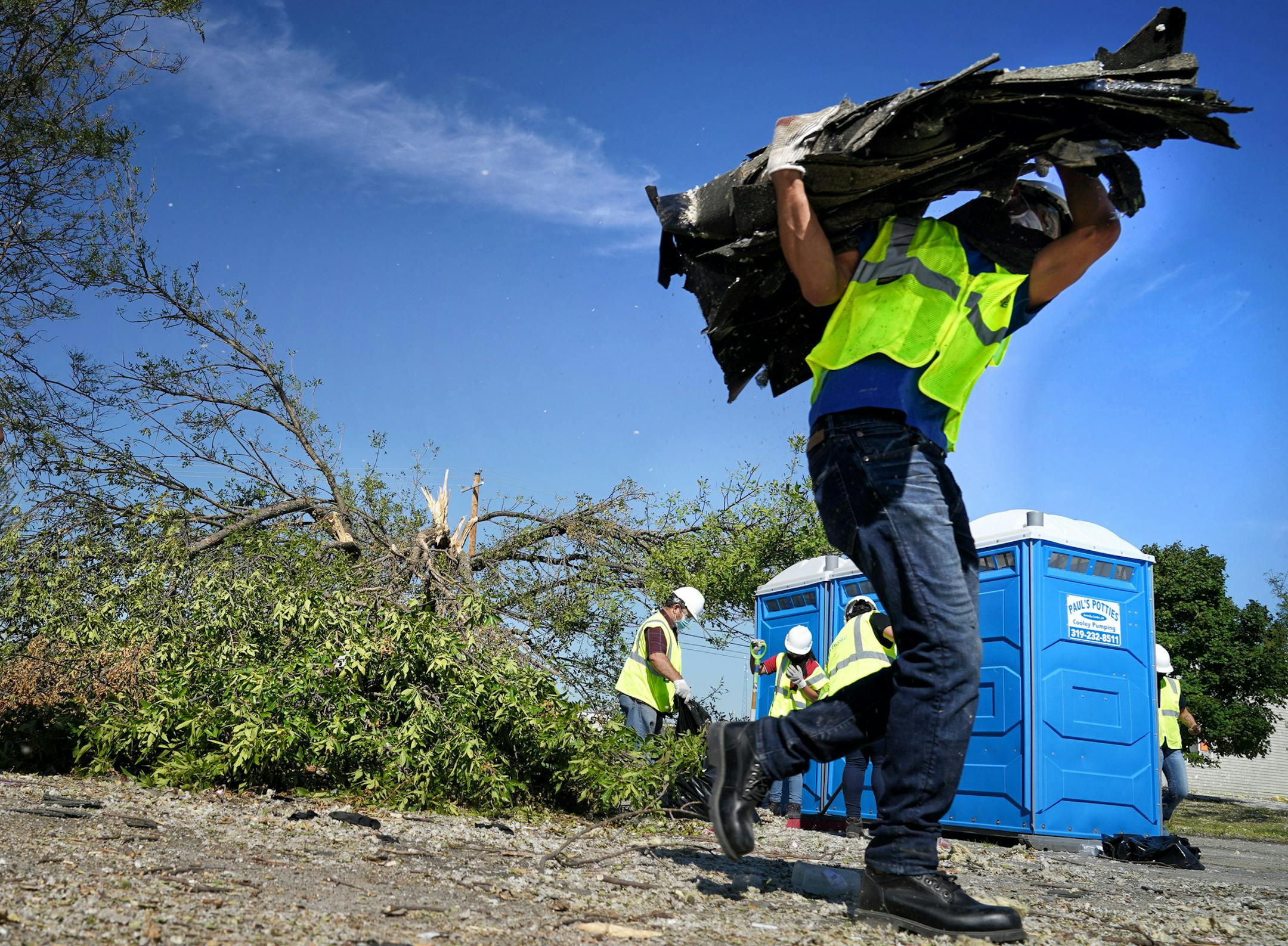 Neighbors, volunteers and contract workers from Blue Sky Restoration cleaned up debris from Monday's derecho that ripped through Cedar Rapids. Derecho storm devastation in Cedar Rapids Iowa, with 130,000 residents the state's second-largest city. The "inland hurricane" last week wiped out half the city's tree canopy and a week later, thousands are still homeless and without power. ] GLEN STUBBE • glen.stubbe@startribune.com Tuesday, August 18, 2020 Derecho storm devastation in Cedar Rapids Iowa,
