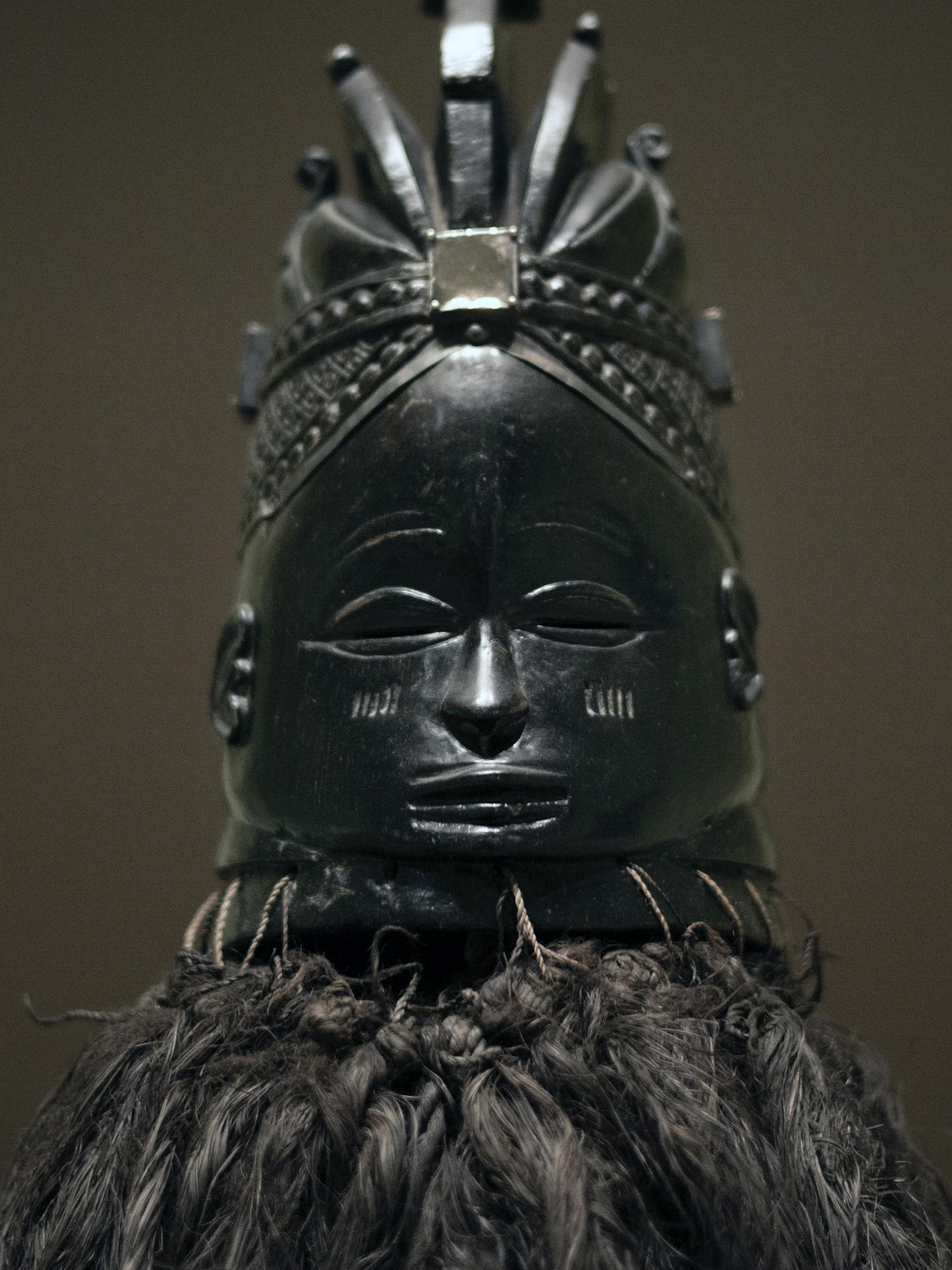 At the Minneapolis Institute of Art, curator this wood mask from Liberia collected by William Siegmann from the "Visions of the Forest" exhibit was worn by women during special rites. On top of the mask there is a Islamic inscription.]Richard Tsong-Taatarii/rtsong- taatarii@startribune.com