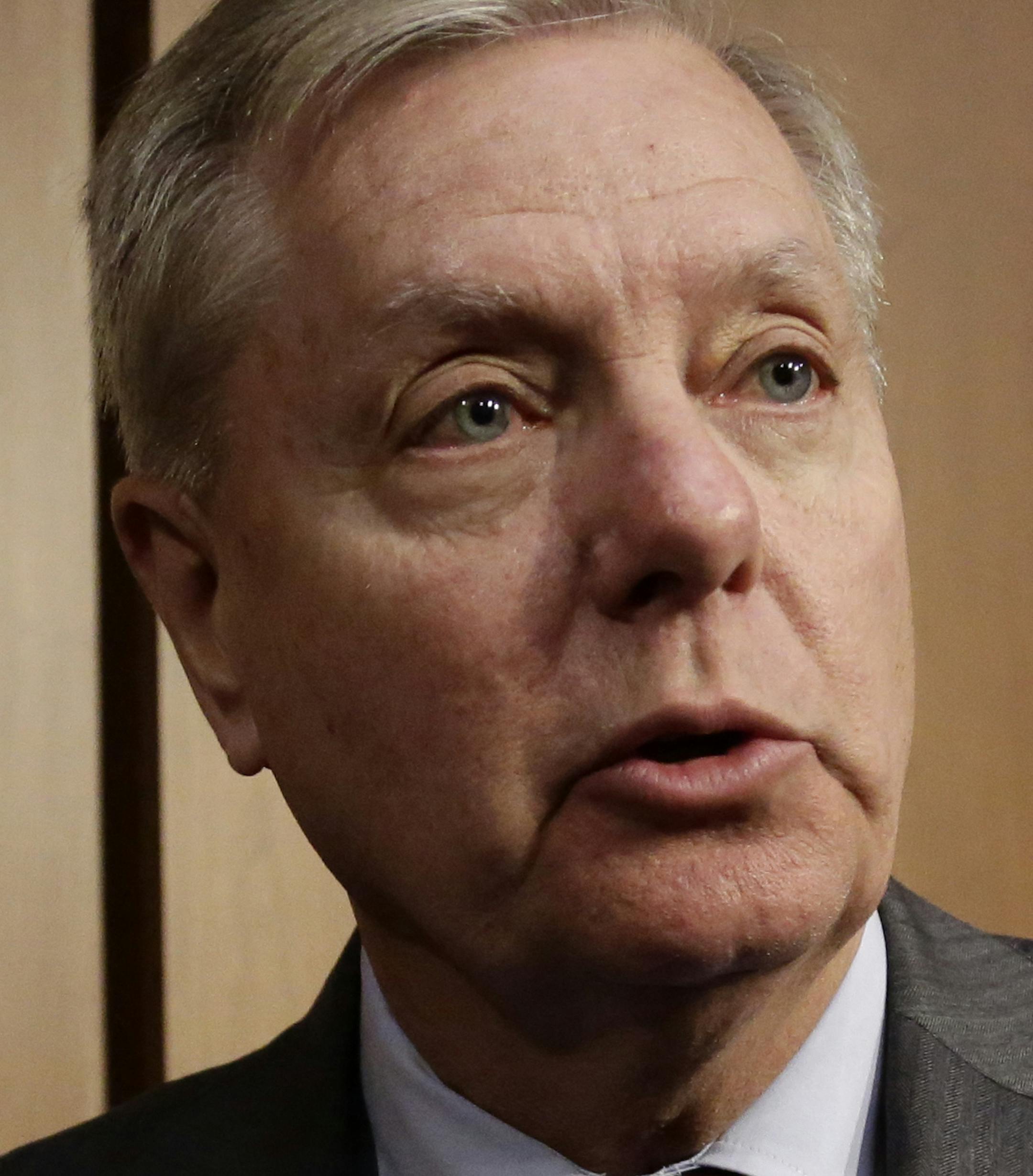 New Senate Judiciary Committee Chairman Lindsey Graham, R-S.C., speaks to reporters at the end of a day of testimony by attorney general nominee William Barr on Capitol Hill in Washington, Tuesday, Jan. 15, 2019. (AP Photo/J. Scott Applewhite)
