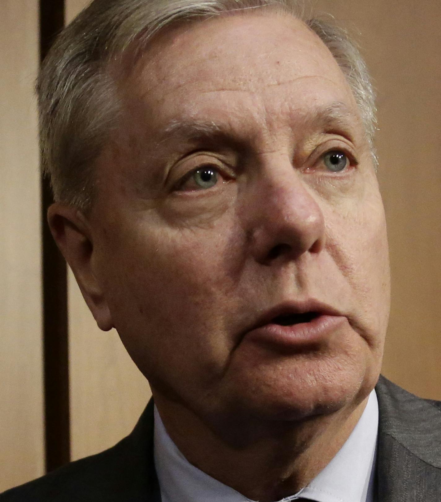 New Senate Judiciary Committee Chairman Lindsey Graham, R-S.C., speaks to reporters at the end of a day of testimony by attorney general nominee William Barr on Capitol Hill in Washington, Tuesday, Jan. 15, 2019. (AP Photo/J. Scott Applewhite)