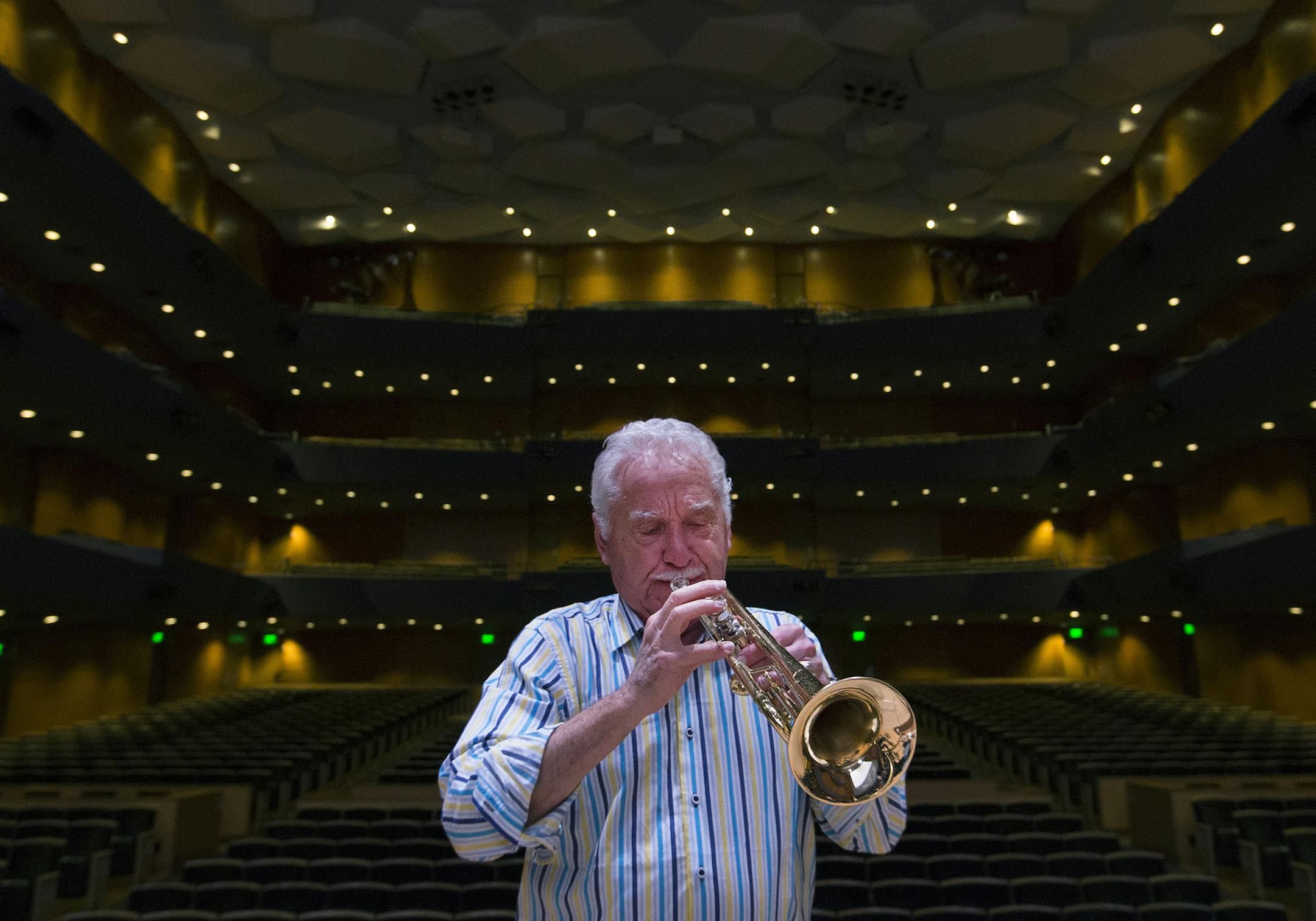 Doc Severinsen, 88, warmed up on his trumpet in an empty Orchestra Hall in Minneapolis, MN. Severinsen is in town to perform Jingle Bell Doc with the Minnesota Orchestra. He is best known for leading the NBC Orchestra on The Tonight Show Staring Johnny Carson. ] CARLOS GONZALEZ &#xef; cgonzalez@startribune.com - December 15, 2015 - 88-year-old Doc Severinsen, who is still playing the trumpet of his own design, still rocking those spangled suits. The beloved musician is performing his annual Chri