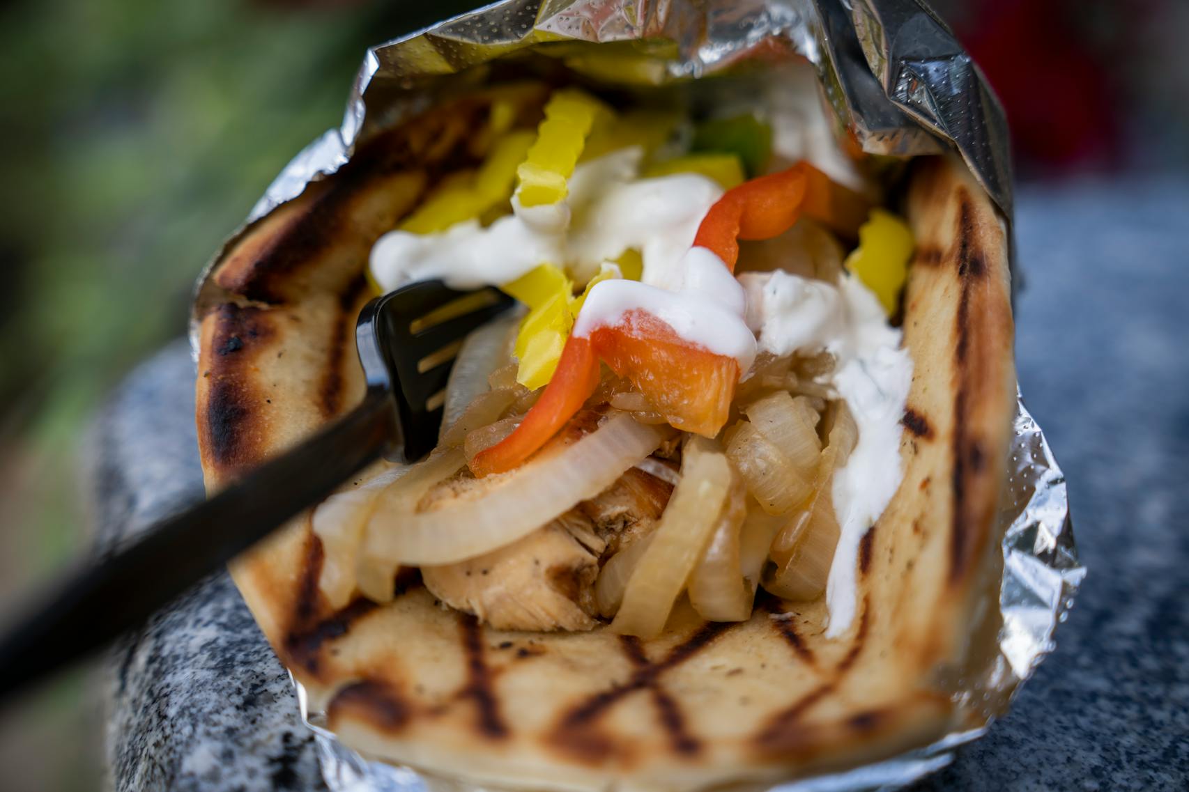 Chicken in-a-Pita from Butcher Boys. The new foods of the 2023 Minnesota State Fair photographed on the first day of the fair in Falcon Heights, Minn. on Tuesday, Aug. 8, 2023. ] LEILA NAVIDI • leila.navidi@startribune.com