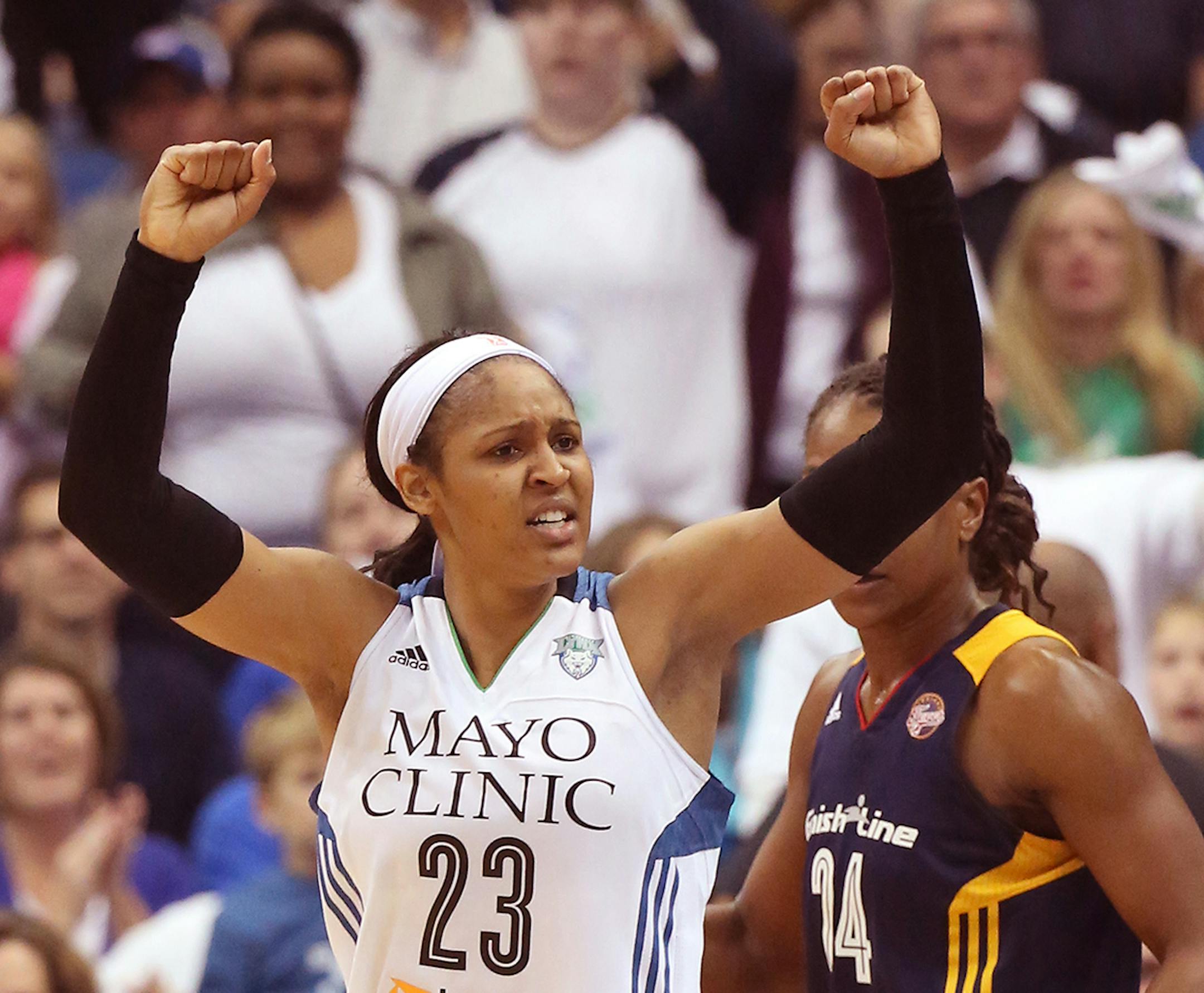 Minnesota Lynx forward Maya Moore (23) celebrated after the Lynx get a turnover during the first half.