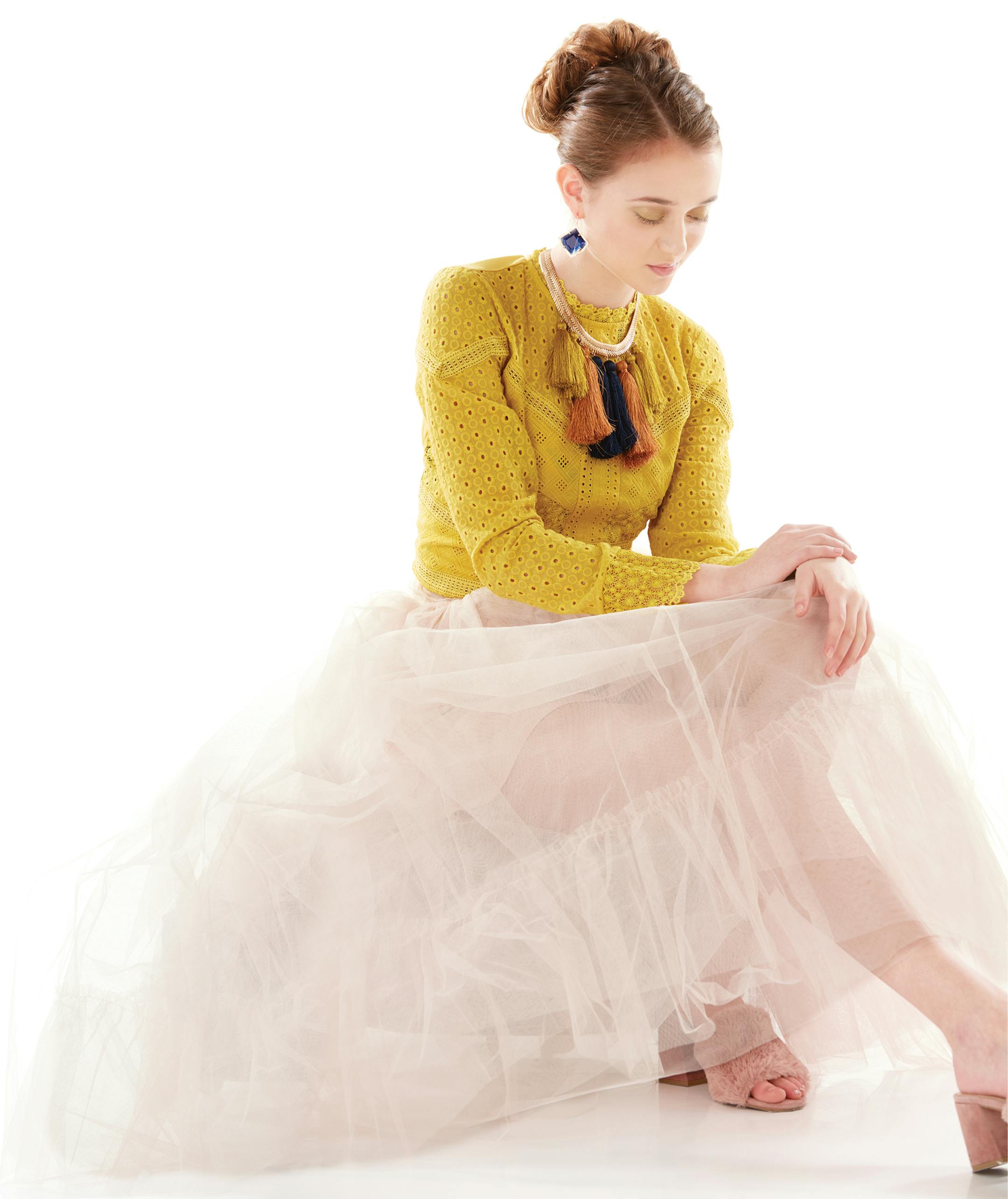 The model is wearing a $55 pair of Kendra Scott earrings from nordstrom.com.