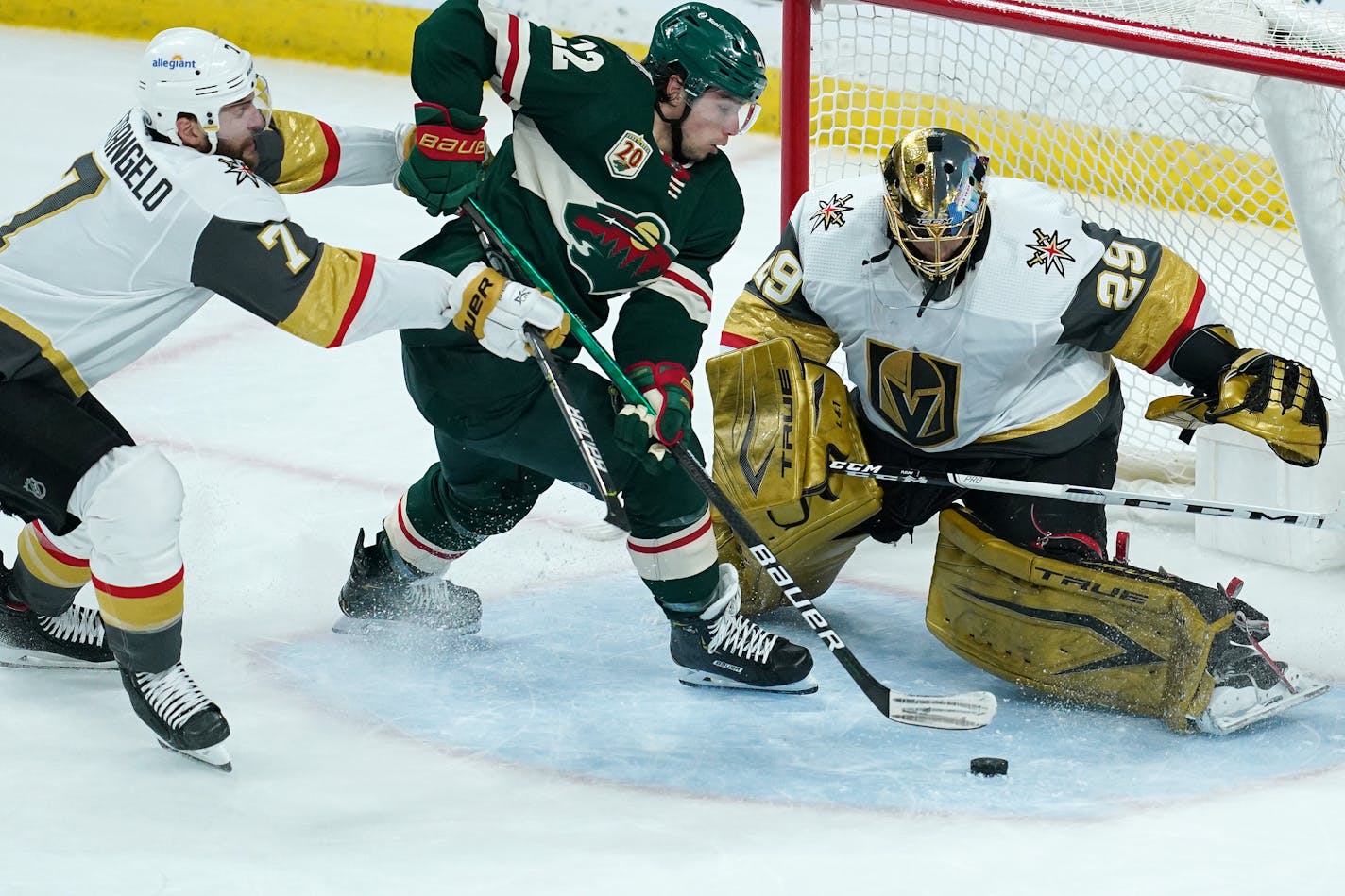 Wild left wing Kevin Fiala (22) tried to score on Golden Knights goaltender Marc-Andre Fleury (29) as defenseman Alex Pietrangelo (7) tried to push him out of the way in the second period. ] ANTHONY SOUFFLE • anthony.souffle@startribune.com