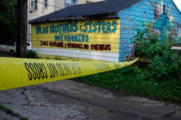 The homicide scene in north Minneapolis where a 25-year-old man was shot at a market on Glenwood Ave., the third murder in a 24-hour period in Septemb