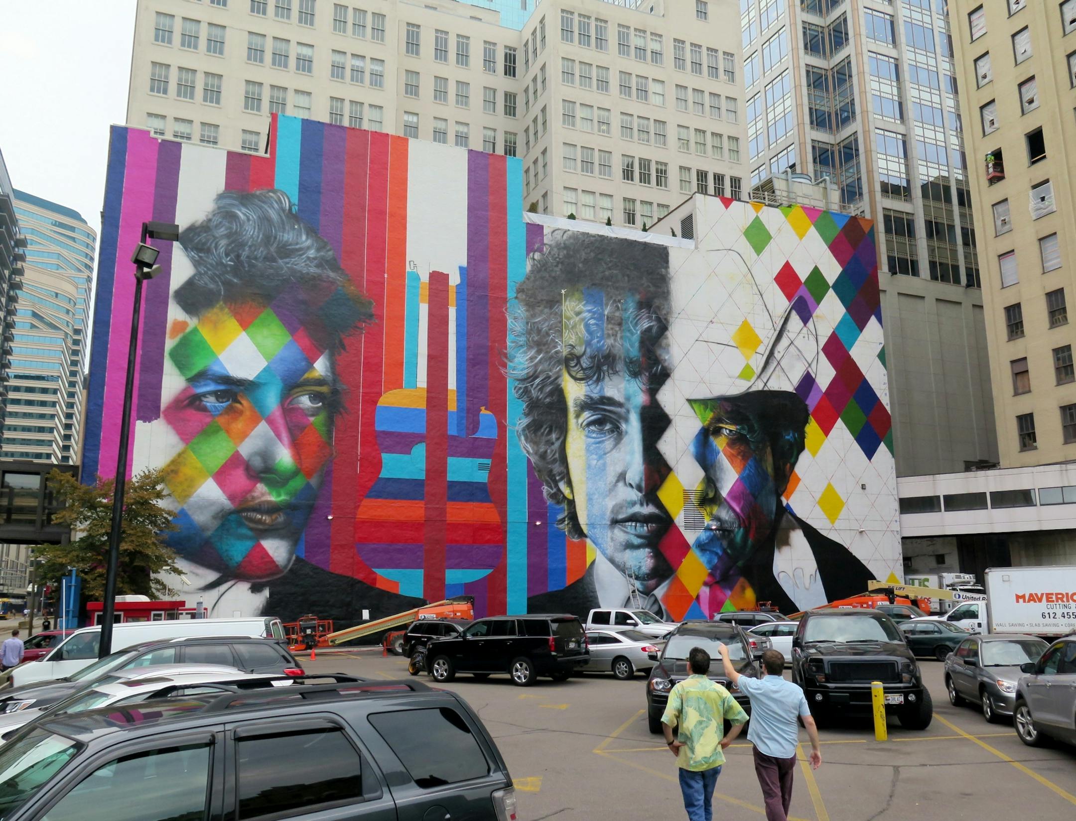 The blank white wall facing the corner of 5th and Hennipen Av has become the 'canvas' for a mural by Brazillian artist Kobra- with multiple images of Bob Dylan. Photo taken 09/01.