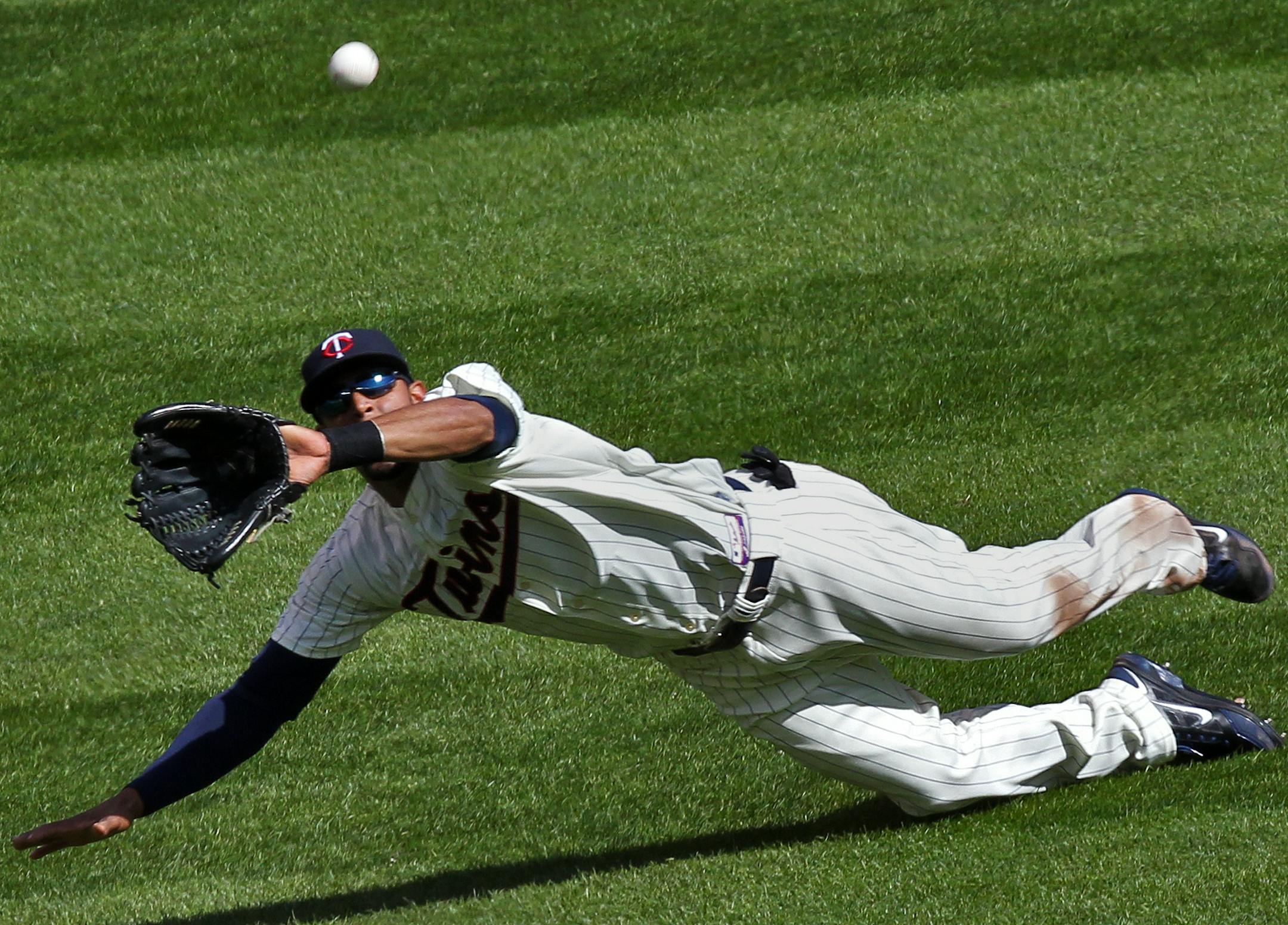 Minnesota Twins vs. Texas Rangers. Twins centerfielder Aaron Hicks made a diving catch of A.J. Pierzynski's at bat in 4th inning action. (MARLIN LEVISON/STARTRIBUNE(mlevison@startribune.com (cq program ) ORG XMIT: MIN1304271701081380
