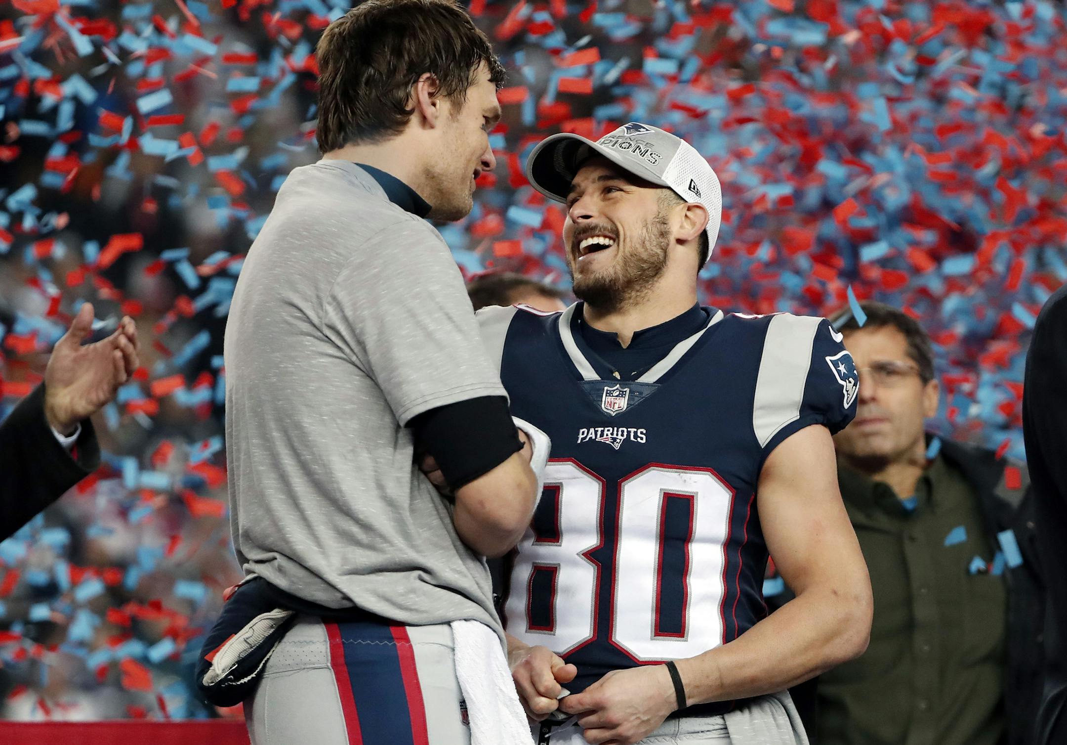 New England Patriots quarterback Tom Brady, left, speaks to wide receiver Danny Amendola after the AFC championship NFL football game against the Jacksonville Jaguars, Sunday, Jan. 21, 2018, in Foxborough, Mass. The Patriots won 24-20. (AP Photo/Winslow Townson)