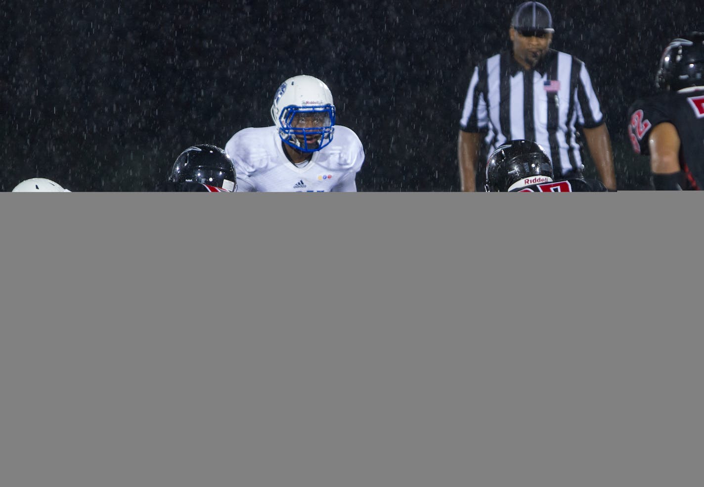 Minneapolis North 50 Jamire Jackson eyes the offense of the St. Paul Central Minutemen (Matt Blewett, special to the Star Tribune)