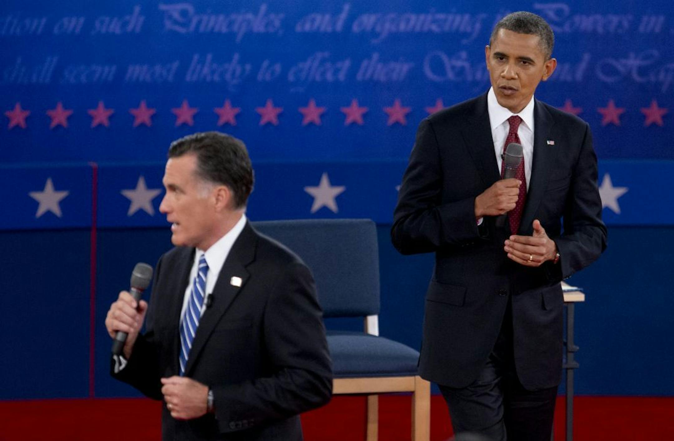 President Barack Obama and Republican presidential candidate, former Massachusetts Gov. Mitt Romney, participate in the presidential debate, Tuesday, Oct. 16, 2012, at Hofstra University in Hempstead, N.Y.