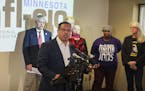 Minnesota union workers stood with MN Attorney General candidate Keith Ellison at a news conference to stress he need to elect an Attorney General ...