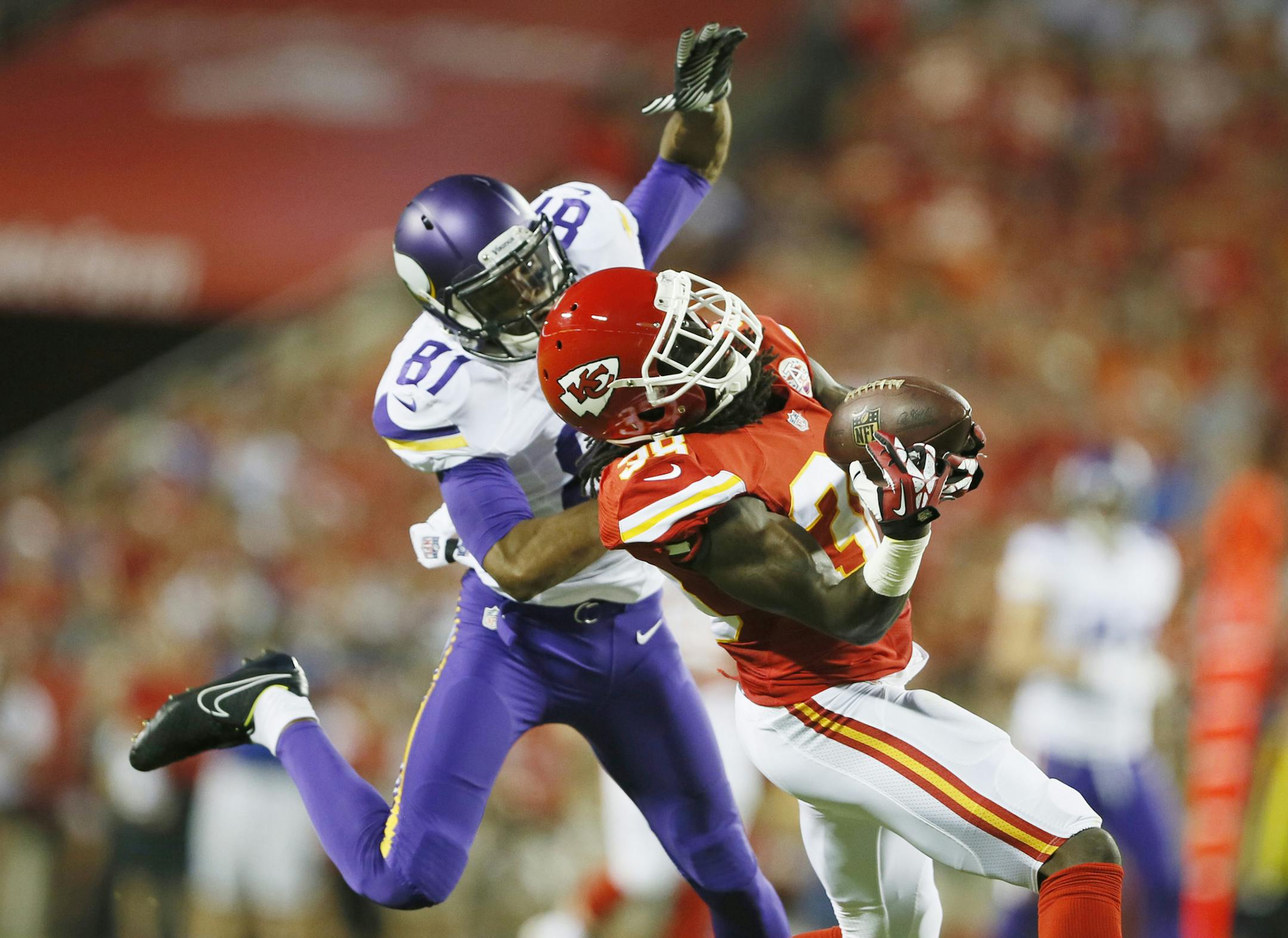 Chiefs cornerback Ron Parker intercepted a pass on Minnesota Vikings wide receiver Jerome Simpson (81) in the first half during preseason NFL football between the Minnesota Vikings and Kansas City Chiefs Saturday August 23 , 2014 in Kansas City ,MO . ] Jerry Holt Jerry.holt@startribune.com ORG XMIT: MIN1408232104007585