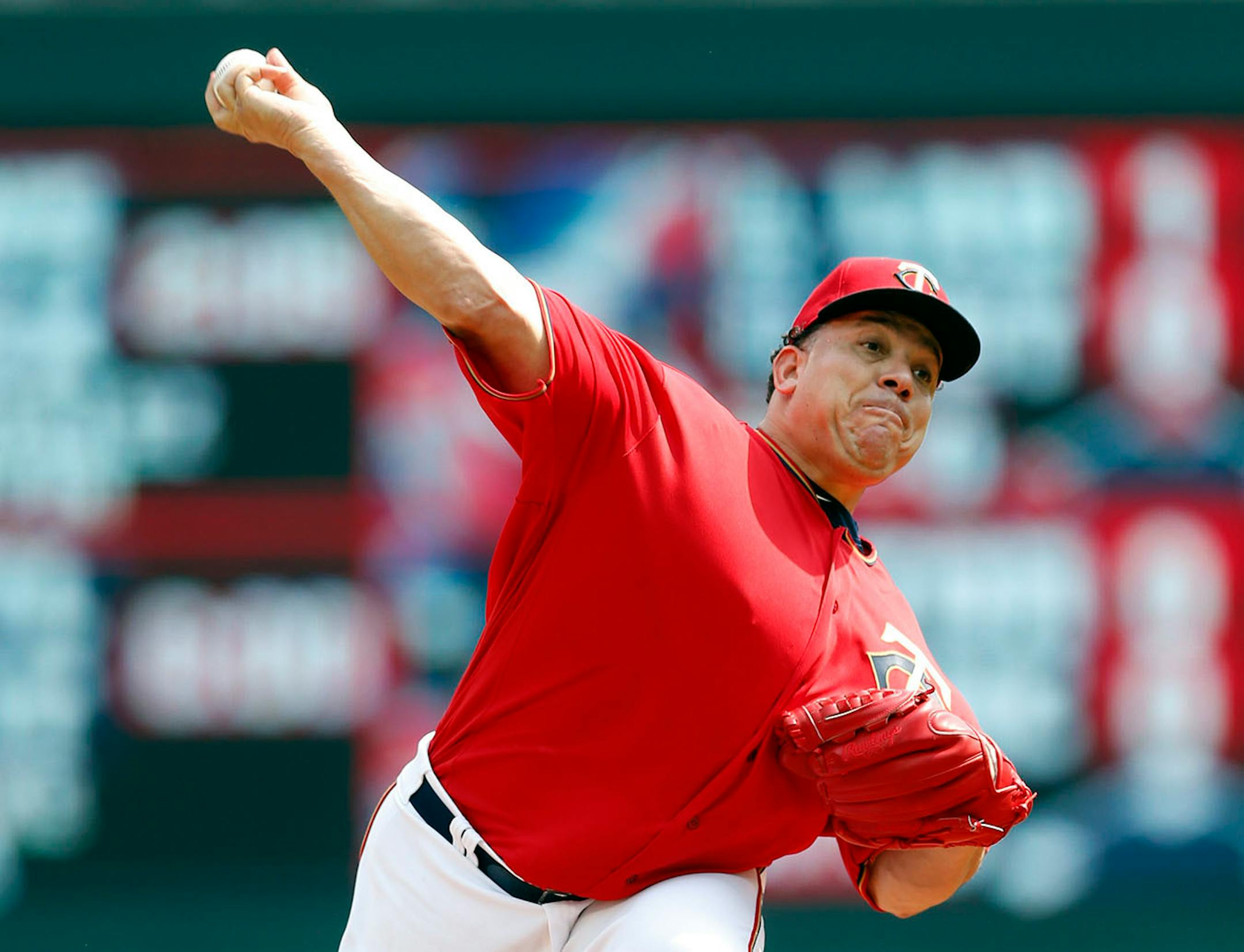 Minnesota Twins pitcher Bartolo Colon throws against the Arizona Diamondbacks in the first inning of a baseball game Sunday, Aug. 20, 2017, in Minneapolis.