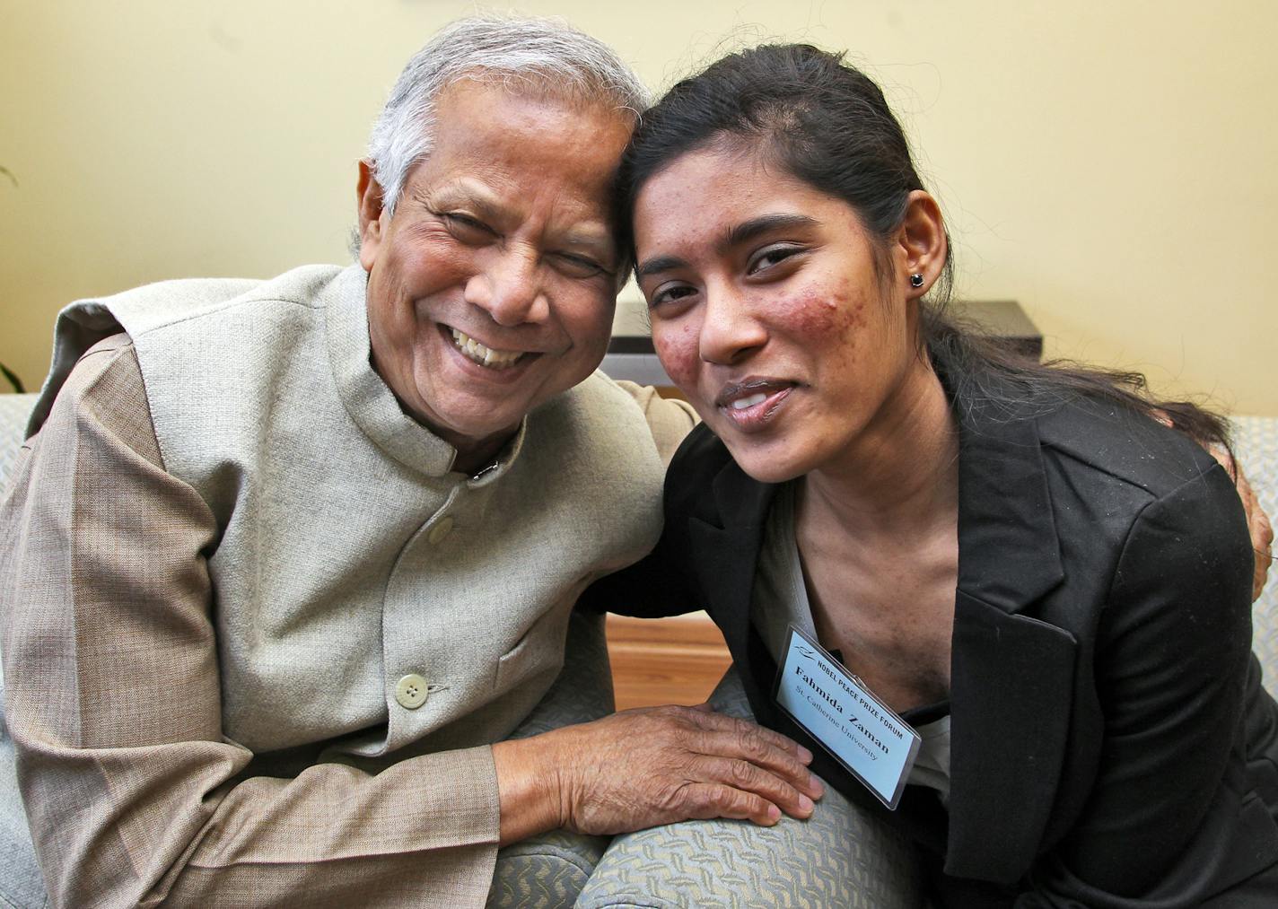 Muhammad Yunus spoke at the Nobel Peace Prize Forum held at Ted Mann Concert Hall on UM campus. During a break he met Fahmida Zaman who attends Augsburg College and was, along with her mother, a recipient of a college loan from Yunus. Yunus, left, greeted Zaman. (MARLIN LEVISON/STARTRIBUNE(mlevison@startribune.com (cq -)