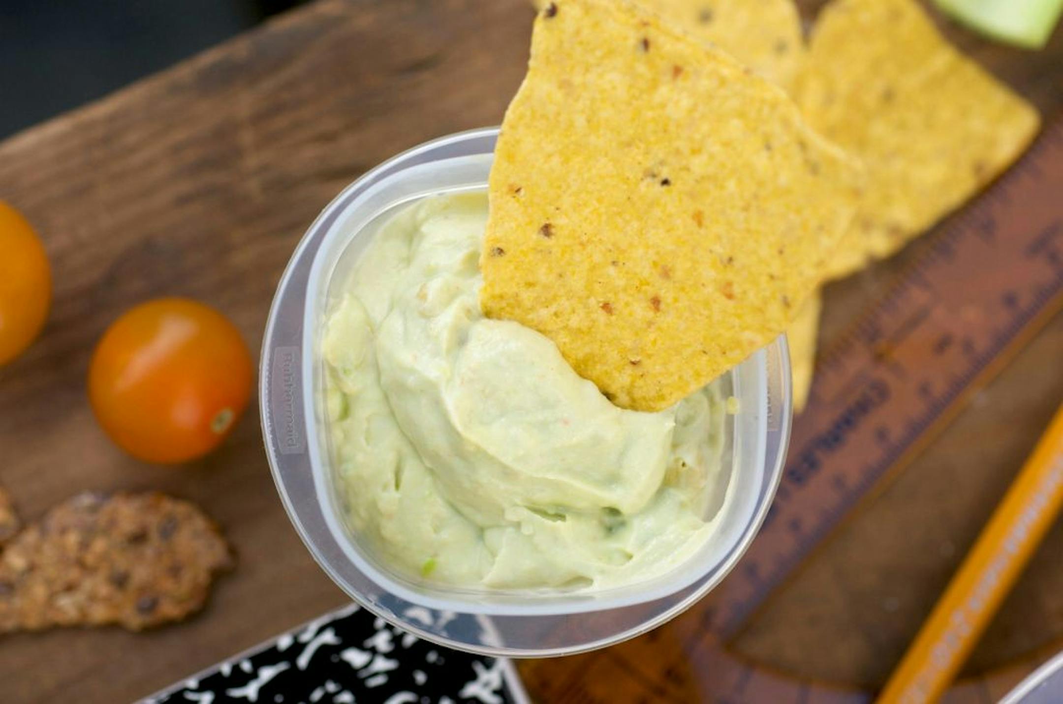 Avocado and yogurt dip, along with vegetables and whole grain chips or pretzels provide a tasty lunch.