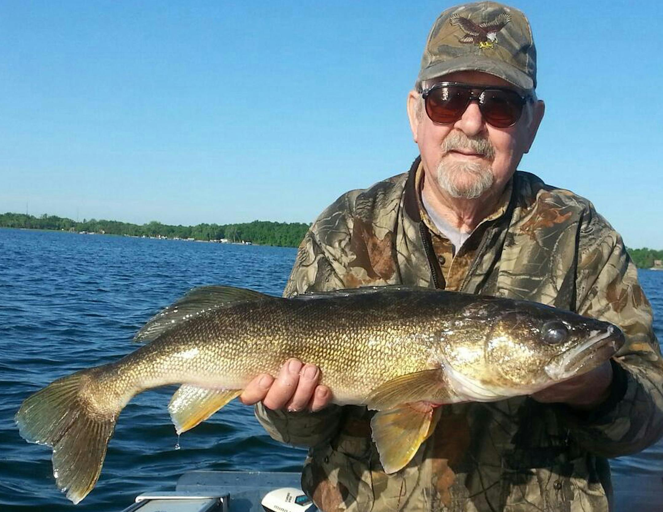 HIS LUNKER Mell Koenig, 80, of Alexandria finally caught his lunker walleye -- a 29.5-incher that weighed 9 1/2 pounds. He was fishing on Lake Le Homme Dieu in about 20 feet of water using a leach. It was released so another lucky angler can enjoy the catch.