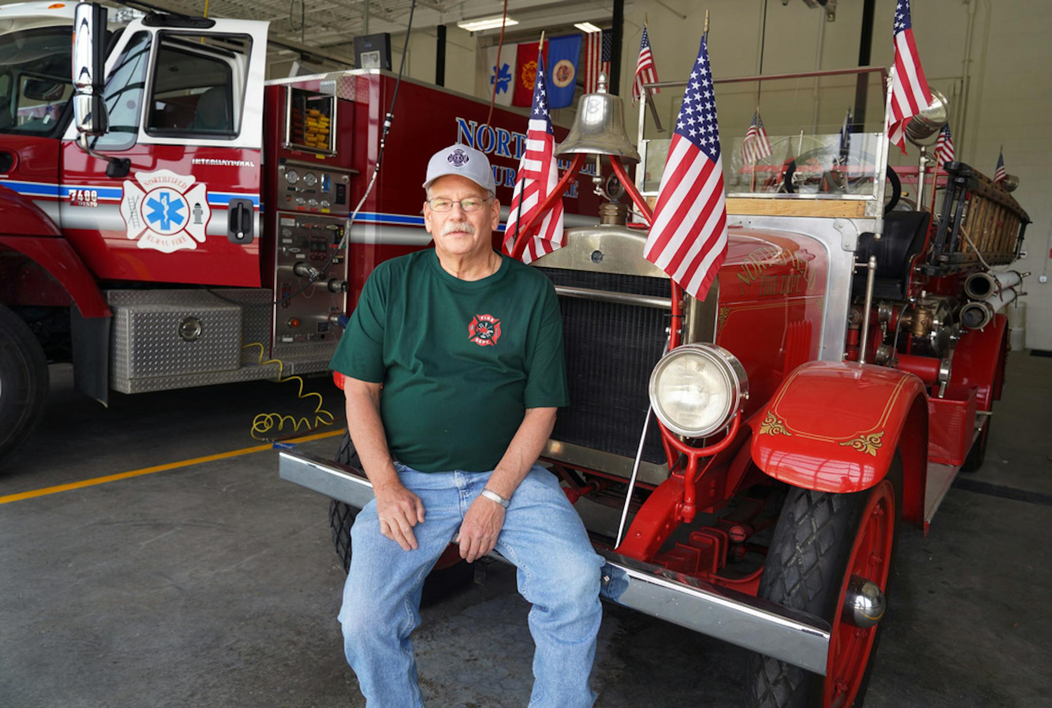 Mike Kruse with a historic truck used in parades and visits to local schools.