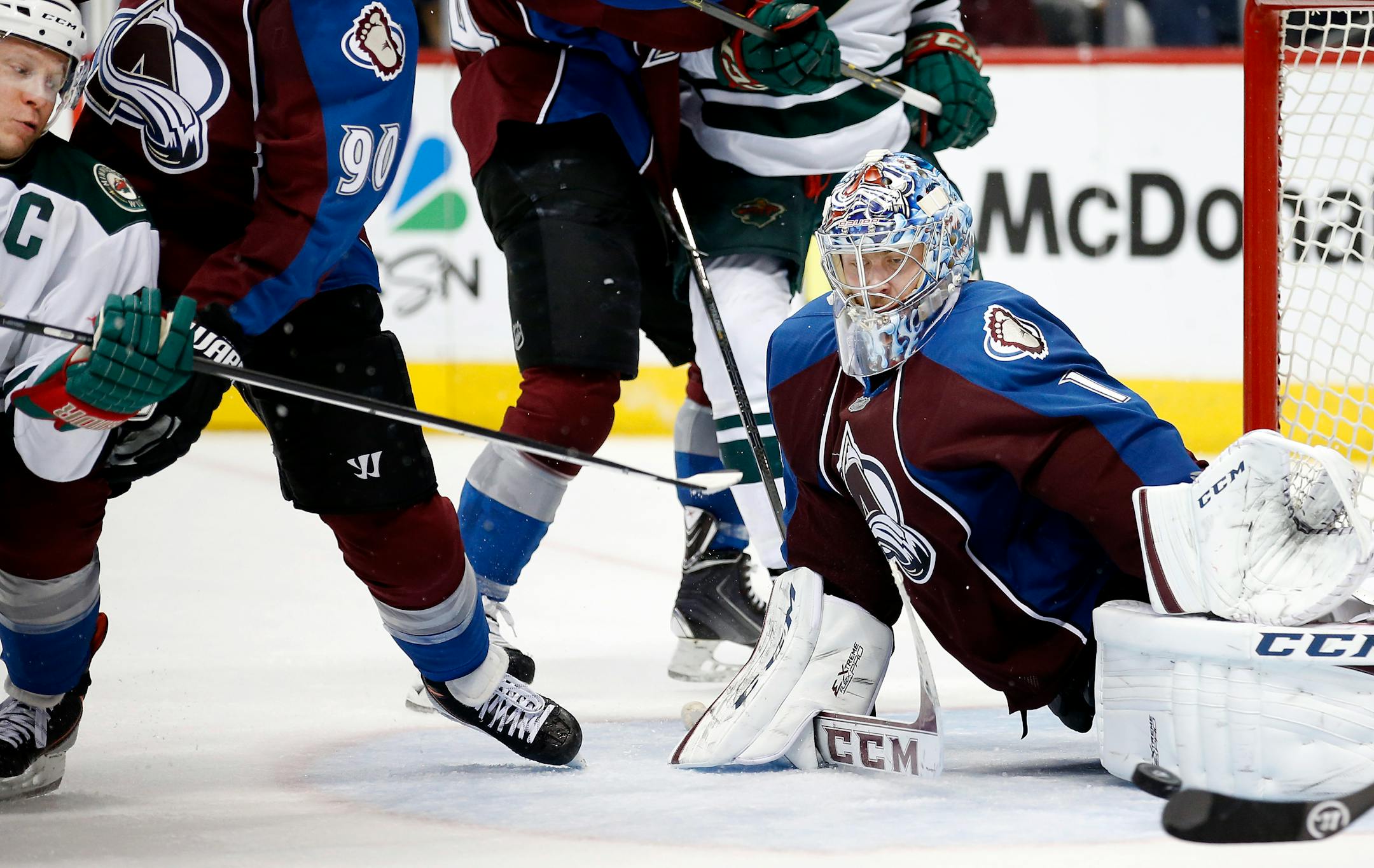 Colorado goalie Semyon Varlamov (1) made a save on a shot by Mikko Koivu in the third period Saturday.