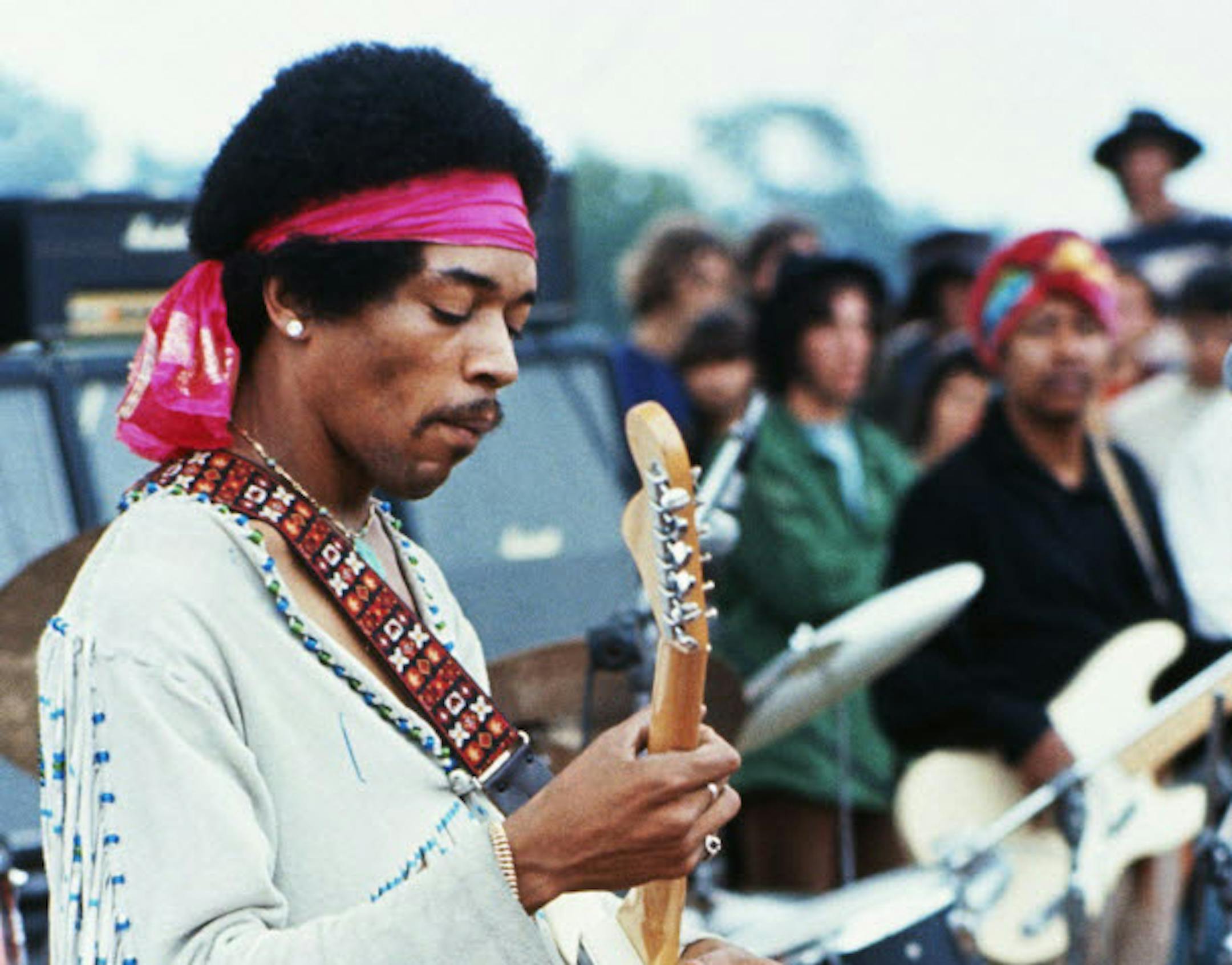 Jimi Hendrix playing his guitar in 1969.