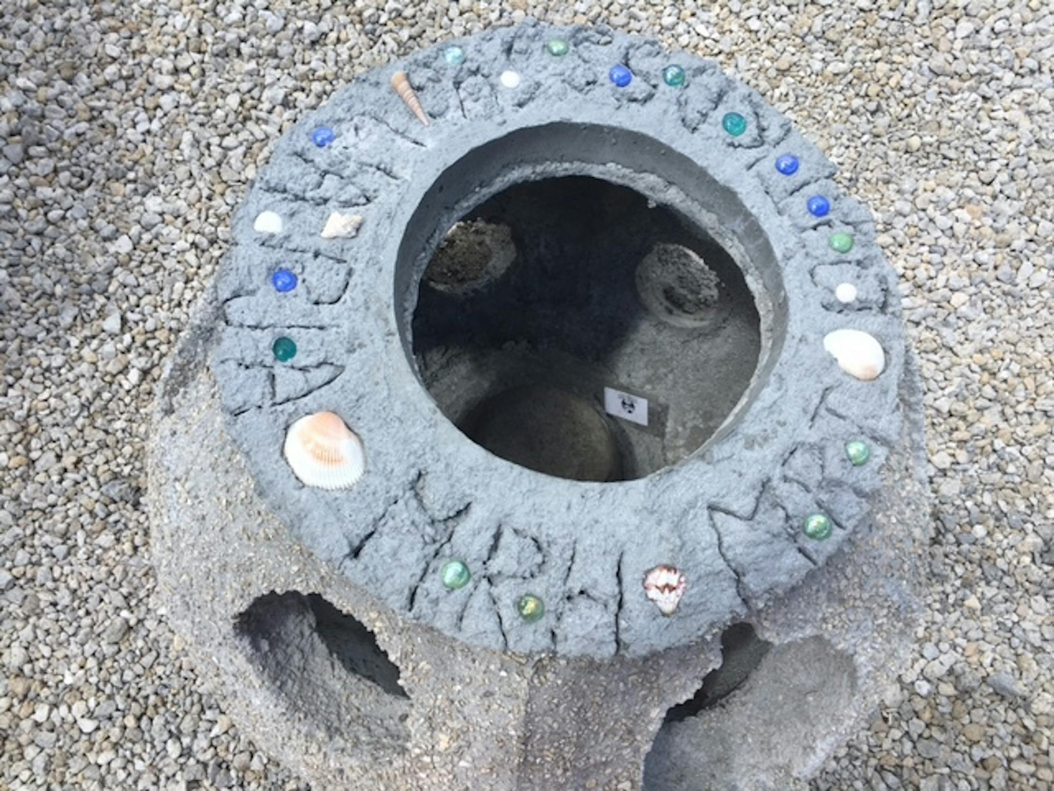 Sue Perry had her remains mixed with concrete to form a ball that would help regenerate coral reef.