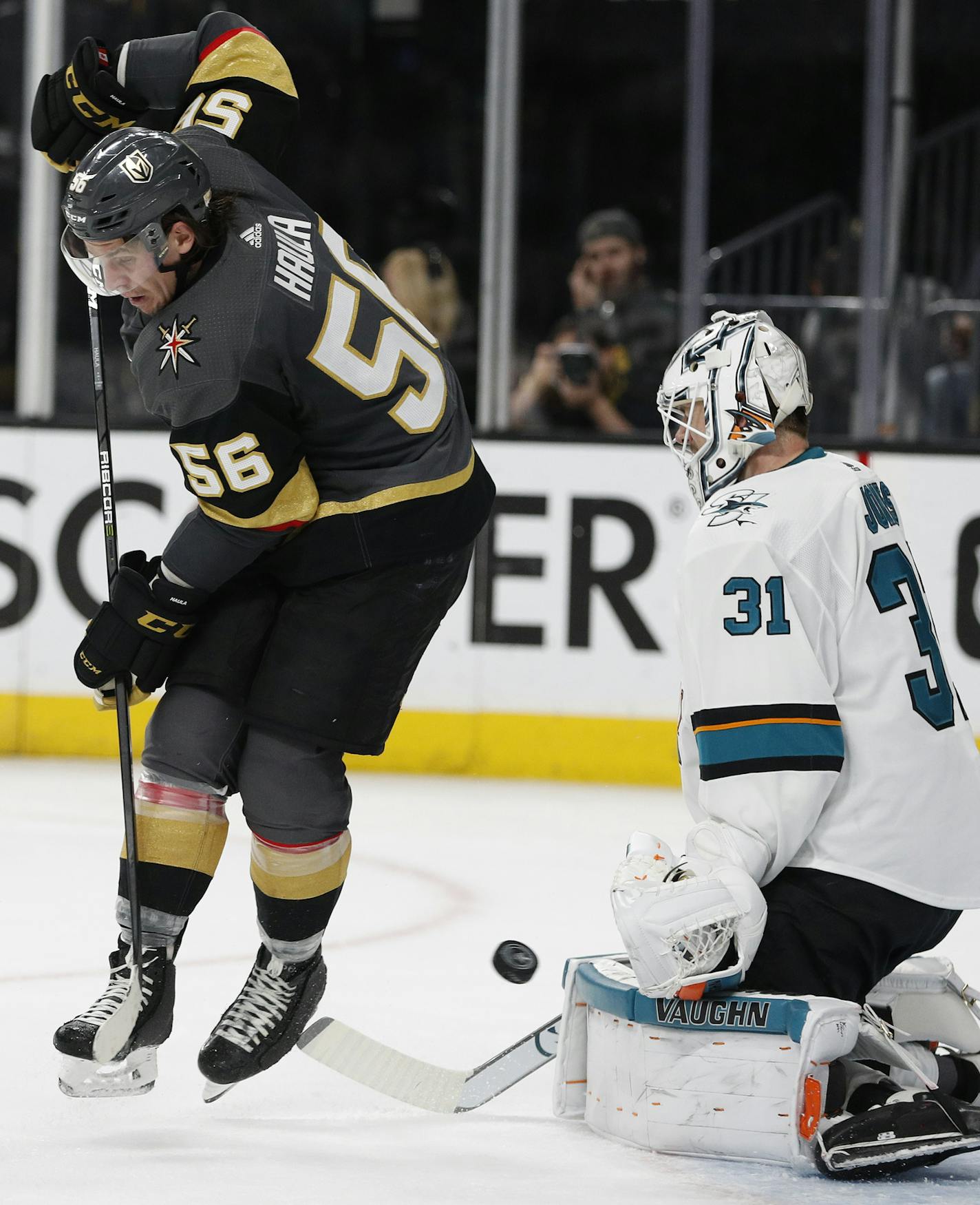 San Jose Sharks goaltender Martin Jones (31) blocks a shot near Vegas Golden Knights left wing Erik Haula (56) during the second period of Game 5 of an NHL hockey second-round playoff series Friday, May 4, 2018, in Las Vegas. (AP Photo/John Locher)