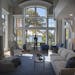 Inside the great room of this year's designer showcase home on Lake Minnetonka. Two-story windows make the most of lake views. The great room was desi