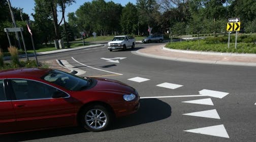 Traffic moved through the roundabout on 66th Street near Hwy. 77 in Richfield.