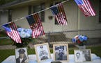 Photos of slain St. Paul Police Officer James Sackett were on display outside his home Friday on the 50th anniversary of his death in the line of duty