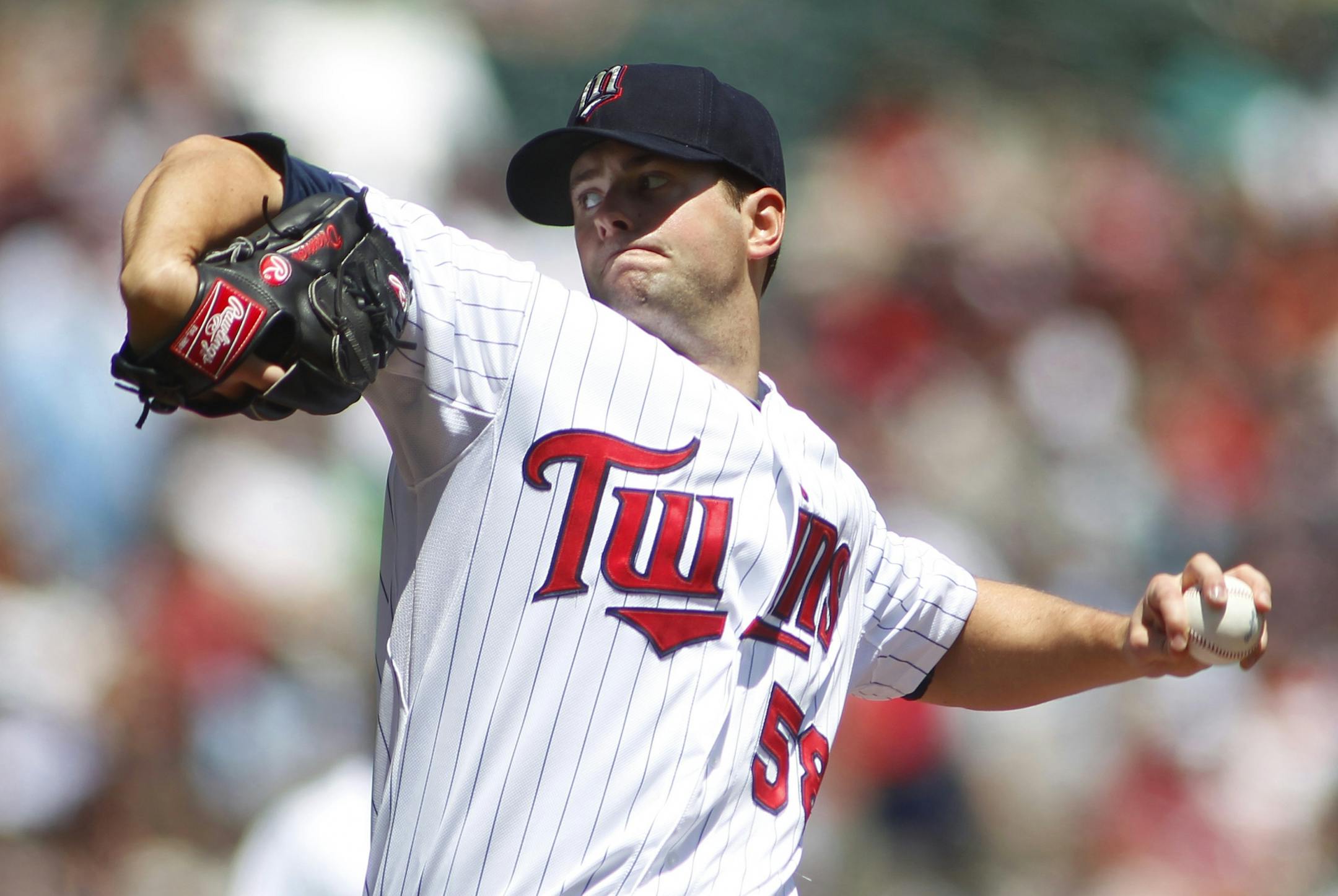 Minnesota Twins starting pitcher Scott Diamond throws to the Oakland Athletics in the first inning of their baseball game Monday, May 28, 2012 in Minneapolis.