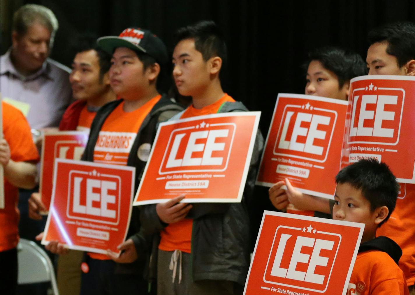 Supporters and family of Fue Lee, left, a lifelong Minneapolis North resident, join him onstage as he runs against Rep. Joe Mullery, currently in his 10th term, for district 59A, at the DFL's Senate District 59 endorsing convention Saturday, April 3, 2016, at Patrick Henry High School inMinneapolis, MN.](DAVID JOLES/STARTRIBUNE)djoles@startribune.com Despite rapidly changing racial demographics in Minnesota, the Minnesota Legislature has remained overwhelmingly white in recent years. Out of 201