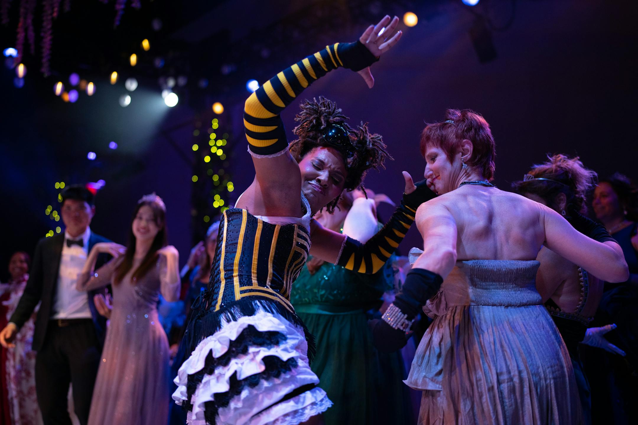 A cast member danced before the guests on opening night of The Queen's Ball: A Bridgerton Experience.