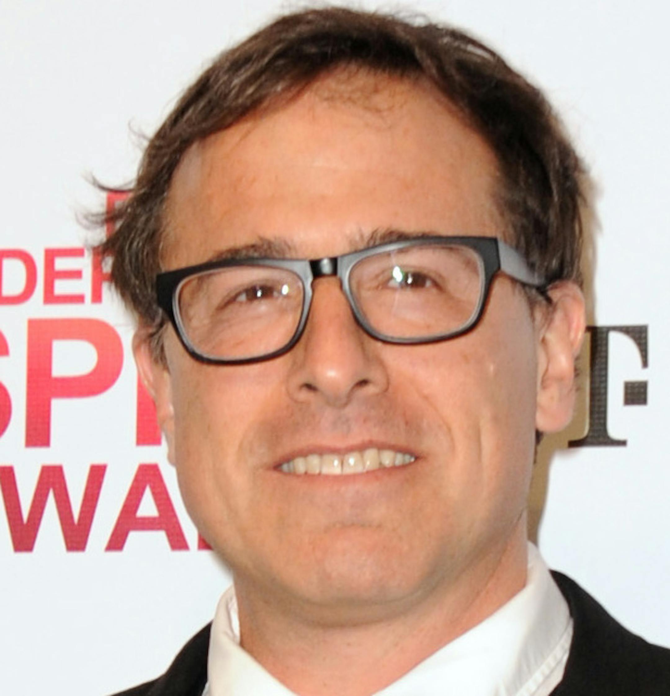 Director David O. Russell poses backstage with the awards for best director and best screenplay for "Silver Linings Playbook" at the Independent Spirit Awards on Saturday, Feb. 23, 2013, in Santa Monica, Calif. (Photo by Jordan Strauss/Invision/AP) ORG XMIT: MIN2013022710395238