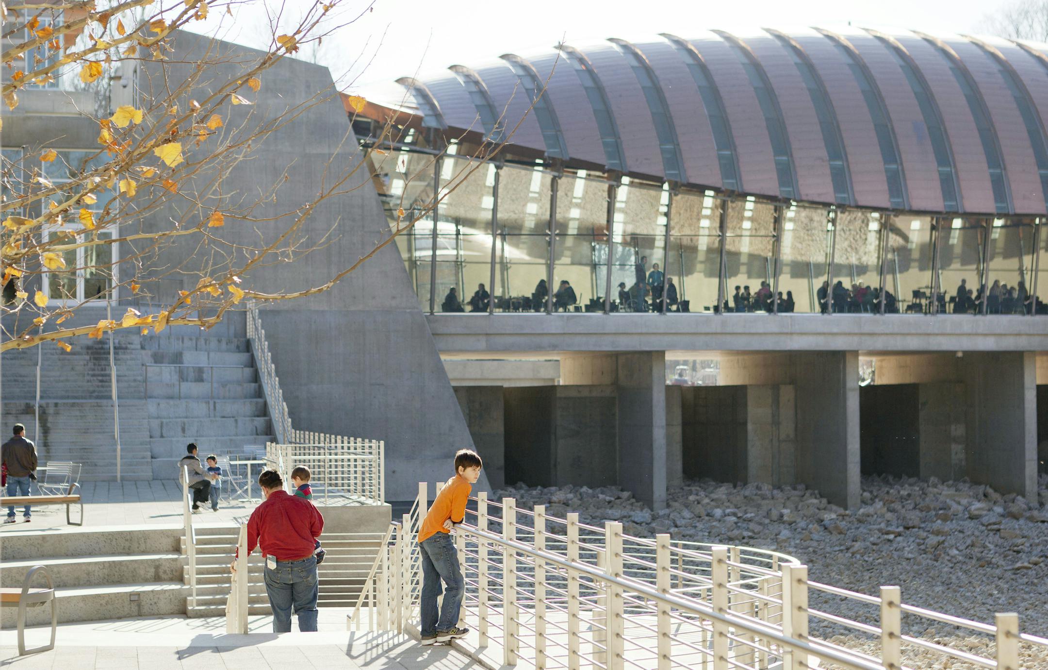 Artgoers at the Crystal Bridges Museum of American Art, in Bentonville, Ark., Dec. 17, 2011. Crystal Bridges, the dream-come-true of Alice Walton, a Walmart heir, is poised to become a place of pilgrimage for art lovers. (Steve Hebert/The New York Times) ORG XMIT: XNYT7