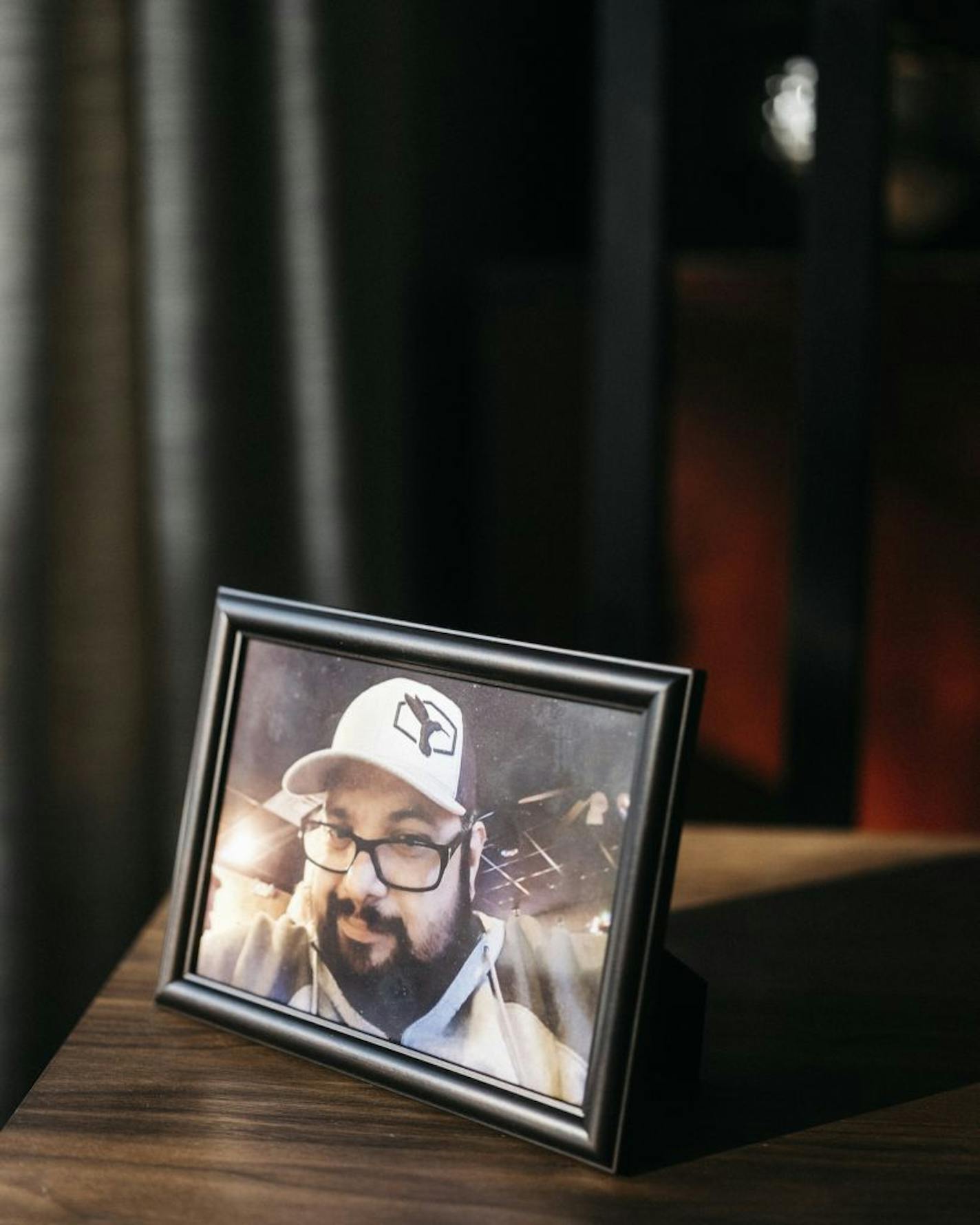 A photo of Albert Aguirre, who attended the huge annual biker rally in Sturgis and later died of the coronavirus, at the home of his friend Dan Herrera in Vermillion, S.D., Oct. 28, 2020. Infectious-disease experts had warned about the dangers of cramming thousands of revelers into the Black Hills of South Dakota at the height of a pandemic, but it was the 80th anniversary of the annual Sturgis rally, and bikers were coming no matter what.