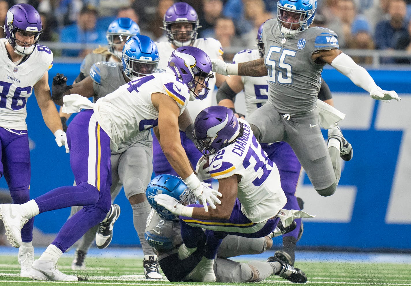 Minnesota Vikings running back Ty Chandler (32) was tackled by Detroit Lions safety C.J. Gardner-Johnson (2) in the first quarter Sunday January ,7 2024 in, Detroit, Mich. ] JERRY HOLT • jerry.holt@startribune.com